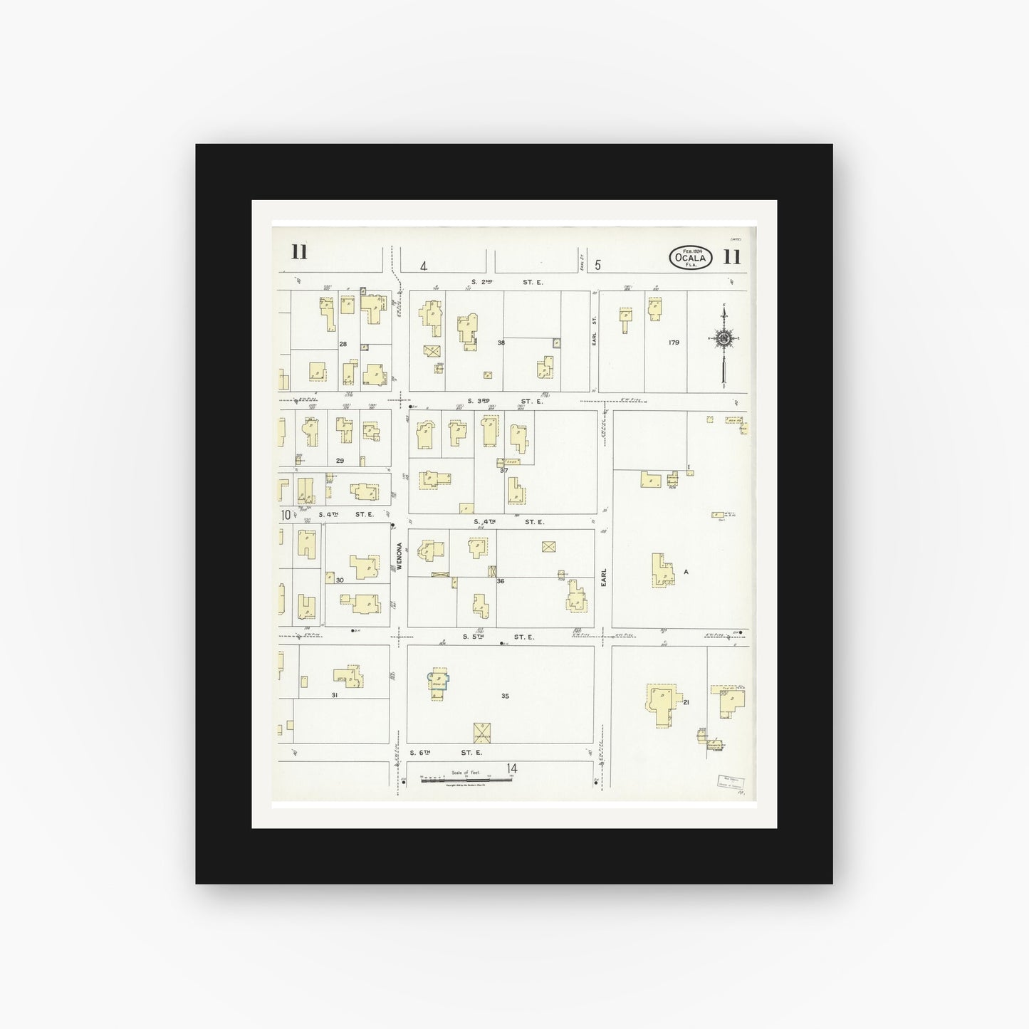 Old map wall art mockup — black gallery frame with white mat — Sanborn Fire Insurance Map from Ocala, Marion County, Florida (1924), Sheet #0011