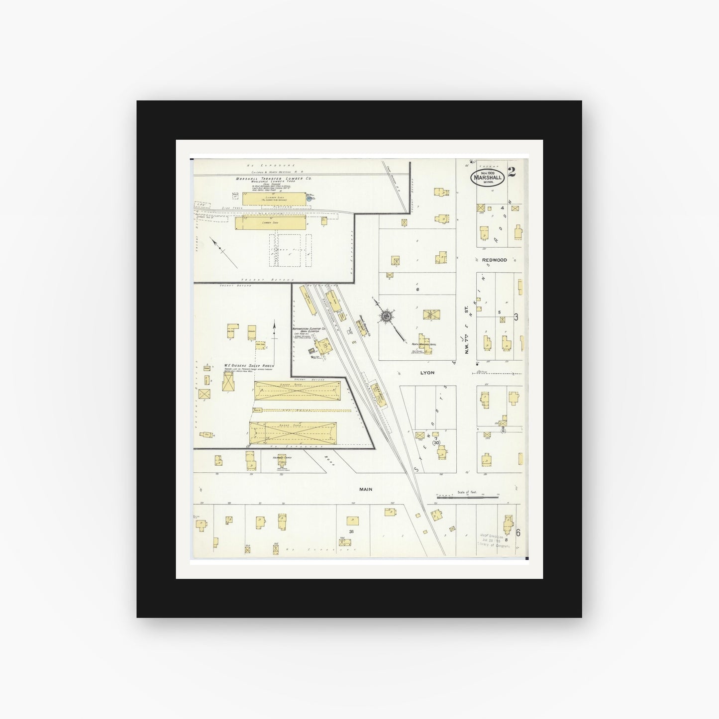 Old map wall art mockup — black gallery frame with white mat — Sanborn Fire Insurance Map from Marshall, Lyon County, Minnesota (1909), Sheet #0002