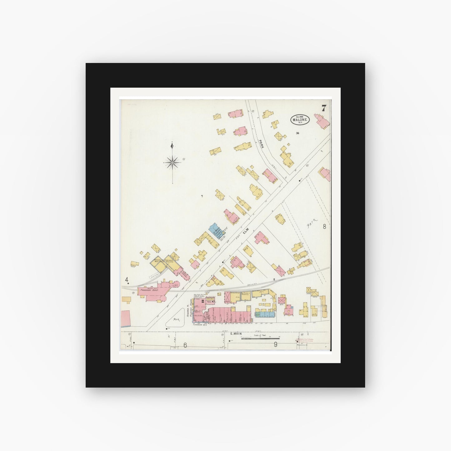 Old map wall art mockup — black gallery frame with white mat — Sanborn Fire Insurance Map from Malone, Franklin County, New York (1898), Sheet #0007