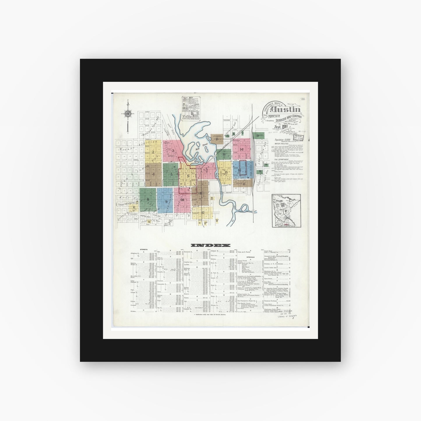 Old map wall art mockup — black gallery frame with white mat — Sanborn Fire Insurance Map from Austin, Mower County, Minnesota (1917), Sheet #0001