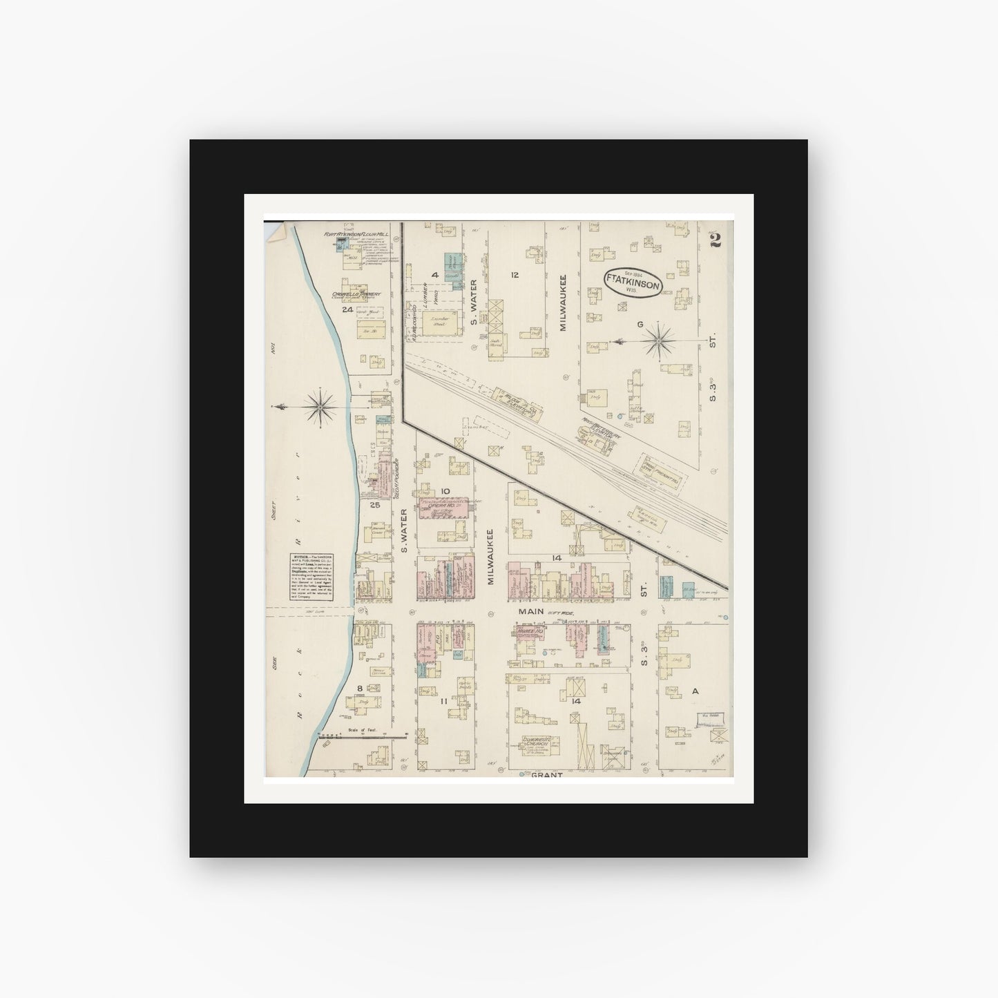 Old map wall art mockup — black gallery frame with white mat — Sanborn Fire Insurance Map from Fort Atkinson, Jefferson County, Wisconsin (1884), Sheet #0002