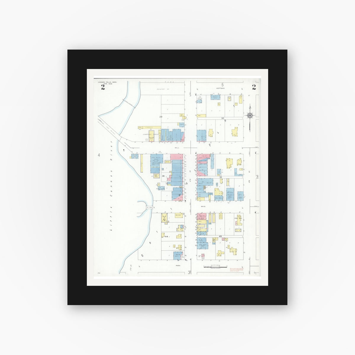 Old map wall art mockup — black gallery frame with white mat — Sanborn Fire Insurance Map from Cannon Falls, Goodhue County, Minnesota (1938), Sheet #0002