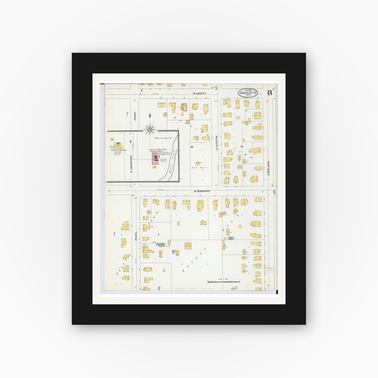 Old map wall art mockup — black gallery frame with white mat — Sanborn Fire Insurance Map from Charlotte, Eaton County, Michigan (1904), Sheet #0008