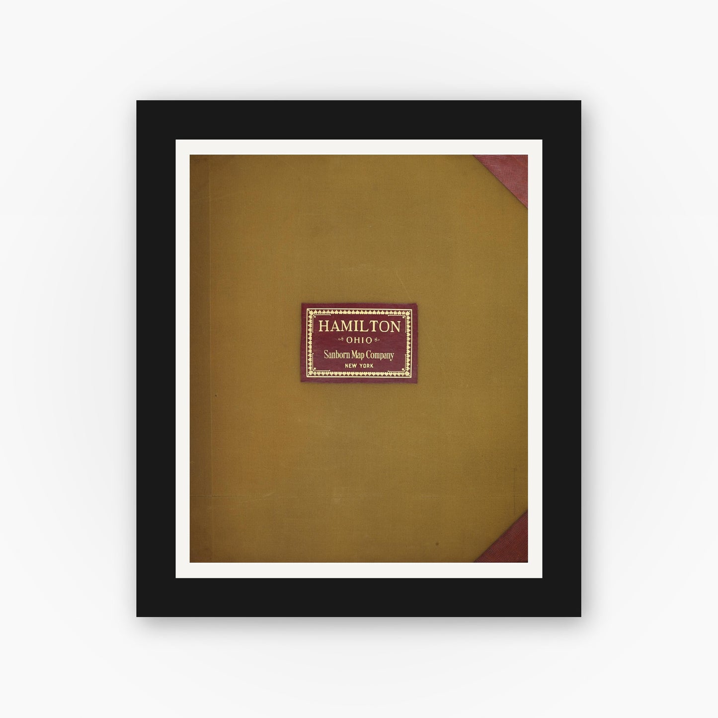 Old map wall art mockup — black gallery frame with white mat — Sanborn Fire Insurance Map from Hamilton, Butler County, Ohio (1950), Sheet #0001