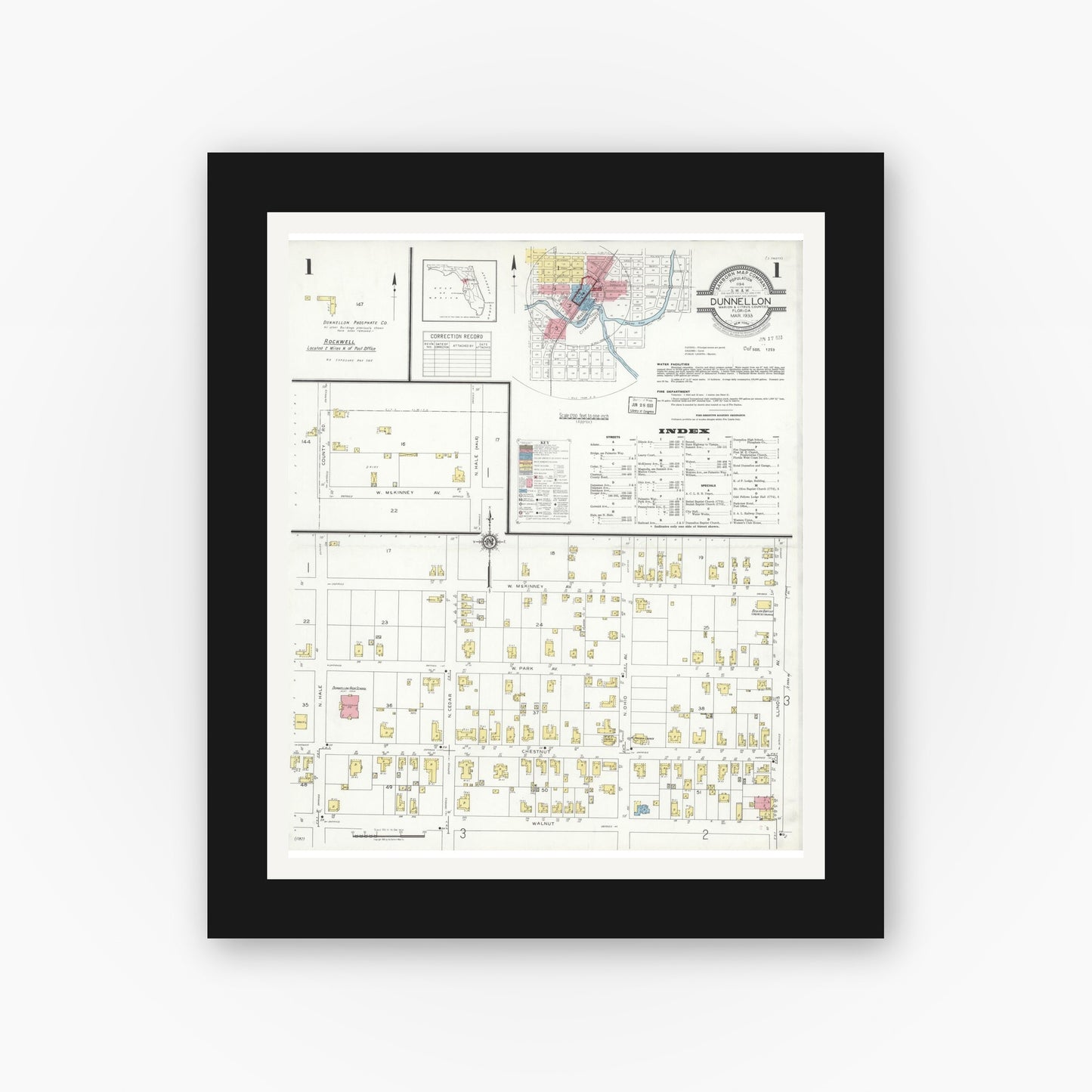 Old map wall art mockup — black gallery frame with white mat — Sanborn Fire Insurance Map from Dunnellon, Marion County, Florida (1933), Sheet #0001