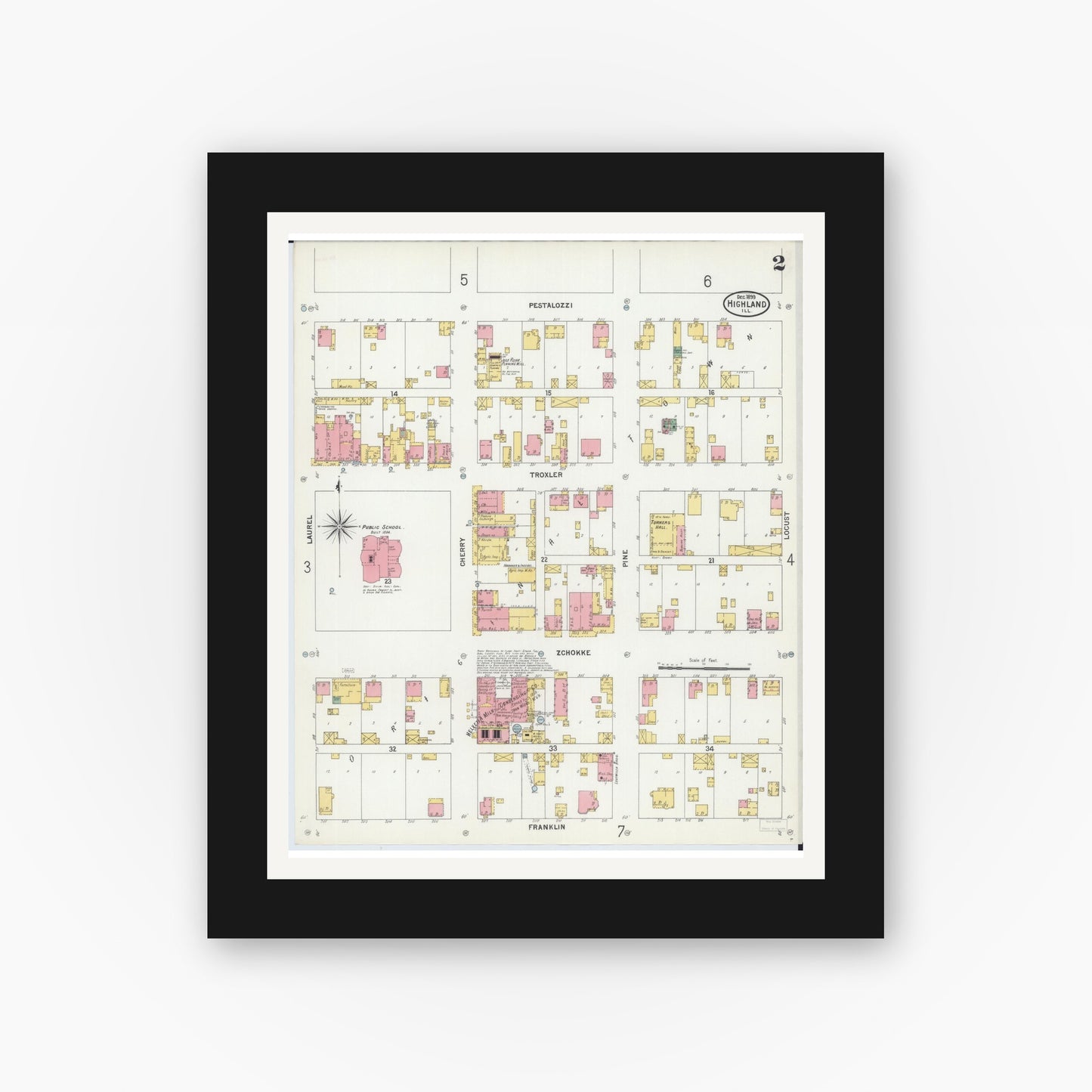 Old map wall art mockup — black gallery frame with white mat — Sanborn Fire Insurance Map from Highland, Madison County, Illinois (1899), Sheet #0002