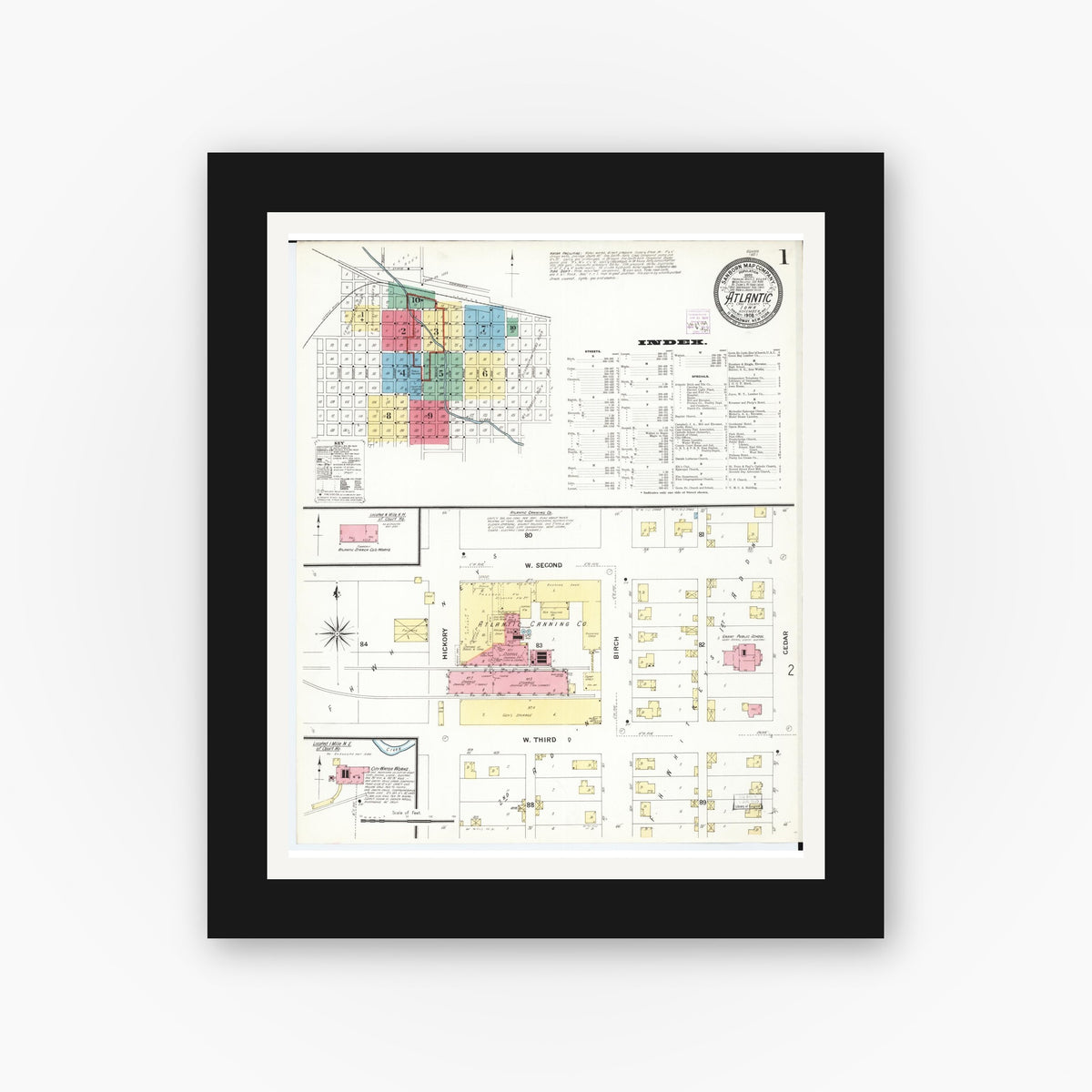 Old map wall art mockup — black gallery frame with white mat — Sanborn Fire Insurance Map from Atlantic, Cass County, Iowa (1908) — Complete Set