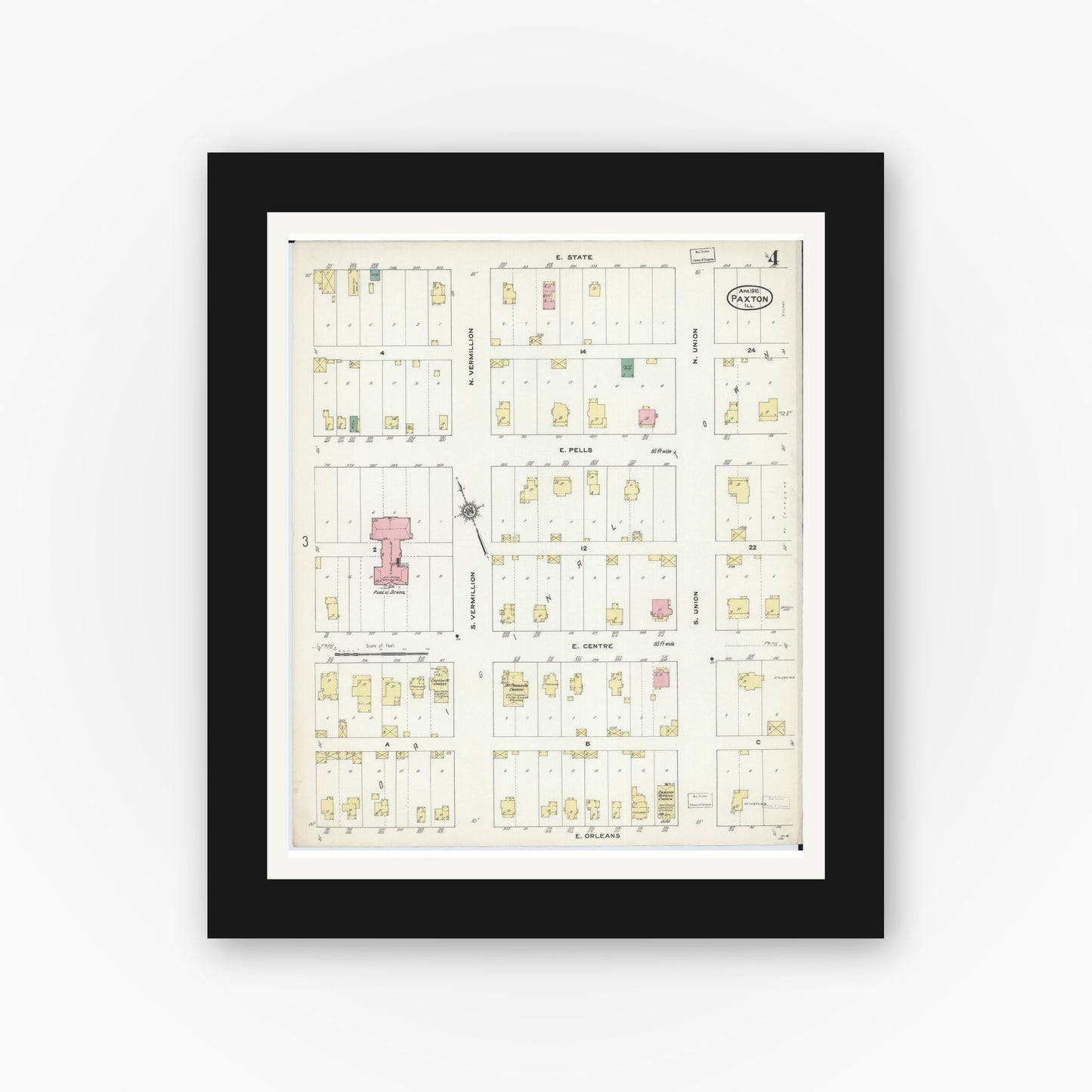 Old map wall art mockup — black gallery frame with white mat — Sanborn Fire Insurance Map from Paxton, Ford County, Illinois (1910), Sheet #0004