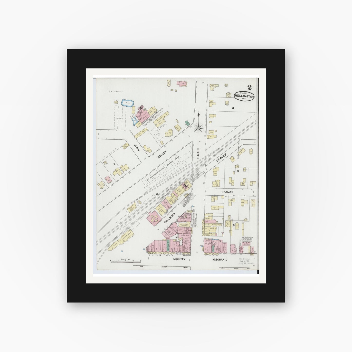 Old map wall art mockup — black gallery frame with white mat — Sanborn Fire Insurance Map from Wellington, Lorain County, Ohio (1889), Sheet #0002