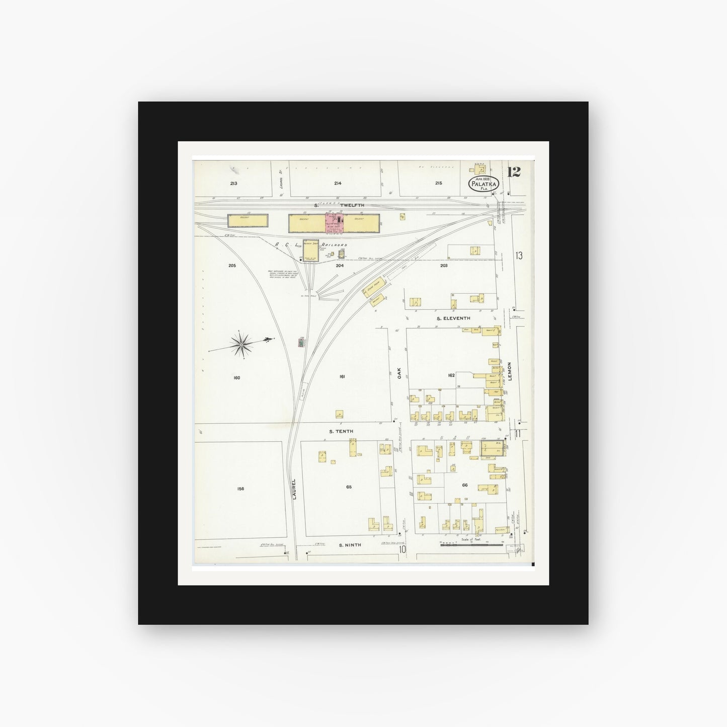 Old map wall art mockup — black gallery frame with white mat — Sanborn Fire Insurance Map from Palatka, Putnam County, Florida (1909), Sheet #0012