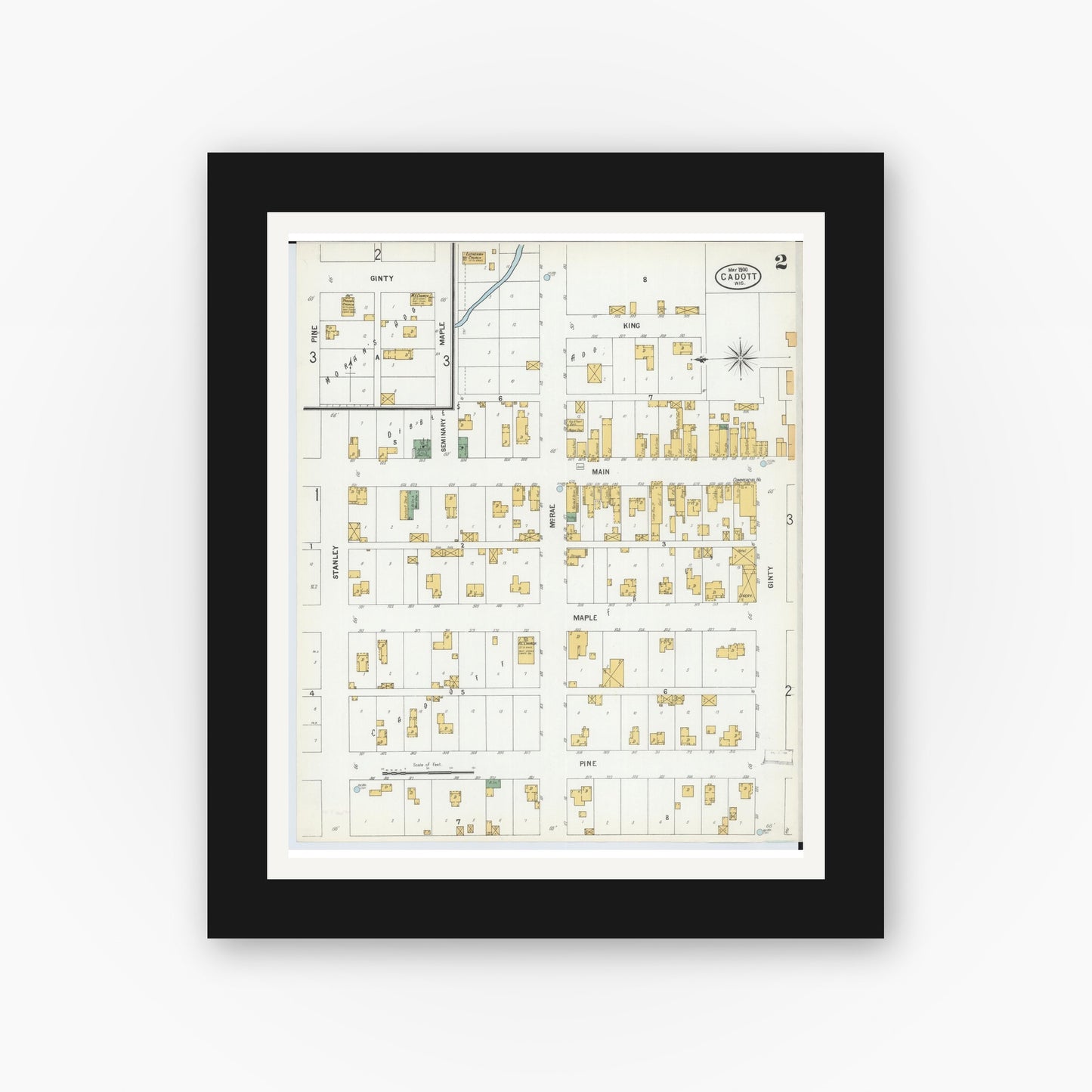 Old map wall art mockup — black gallery frame with white mat — Sanborn Fire Insurance Map from Cadott, Chippewa County, Wisconsin (1900), Sheet #0002