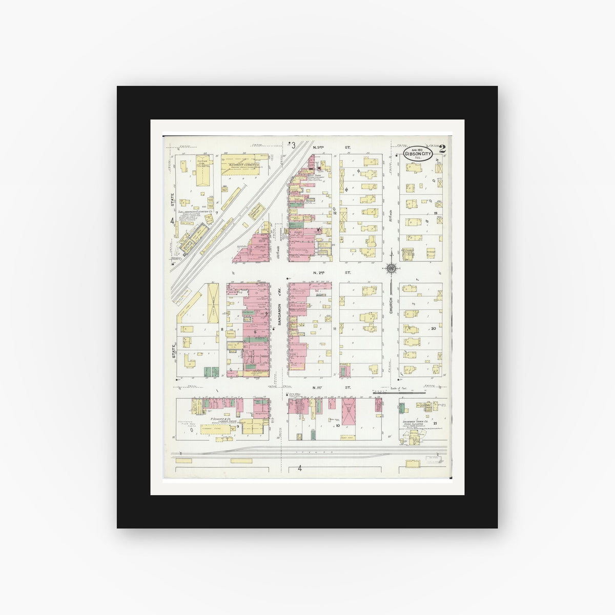 Old map wall art mockup — black gallery frame with white mat — Sanborn Fire Insurance Map from Gibson City, Ford County, Illinois (1910), Sheet #0002