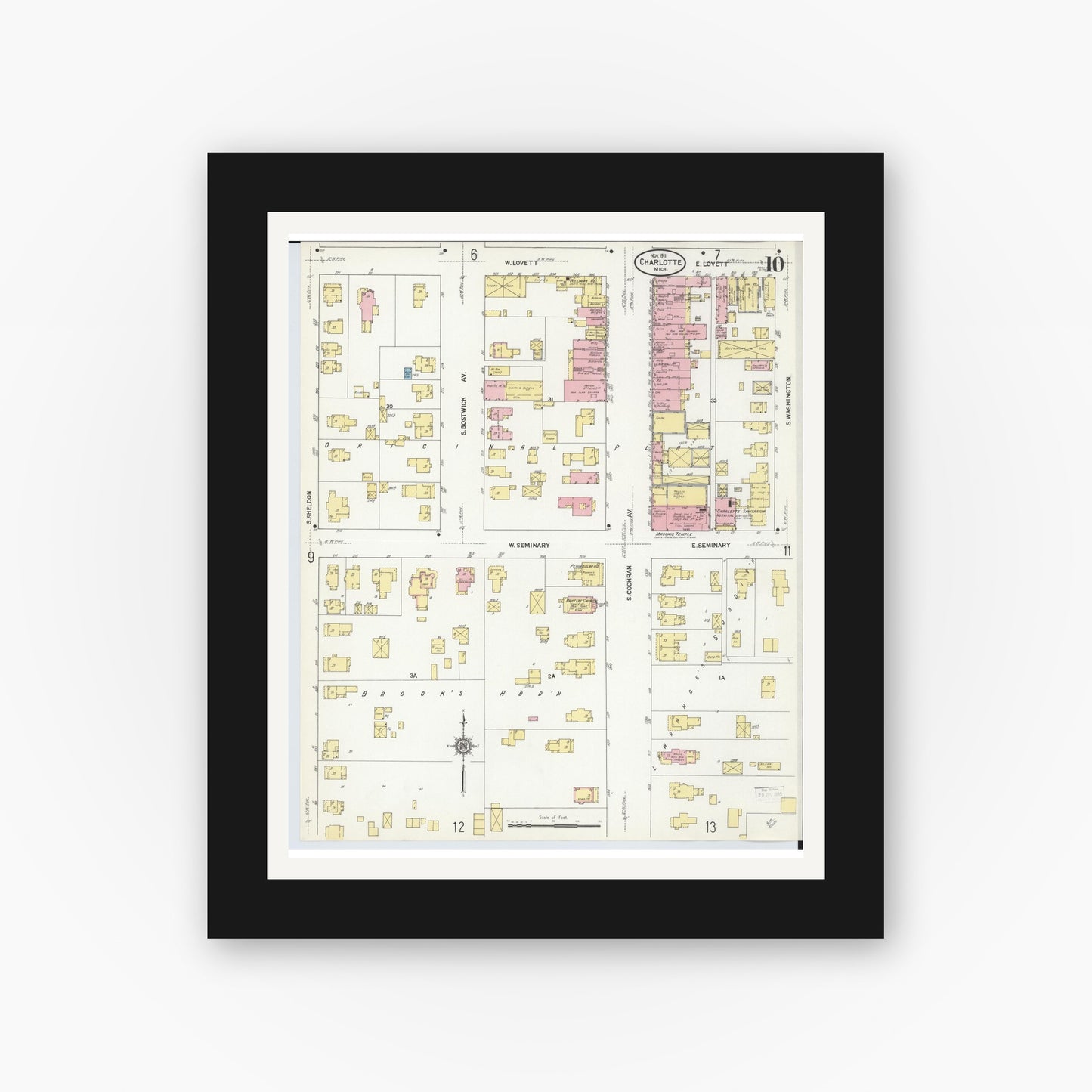 Old map wall art mockup — black gallery frame with white mat — Sanborn Fire Insurance Map from Charlotte, Eaton County, Michigan (1911), Sheet #0010