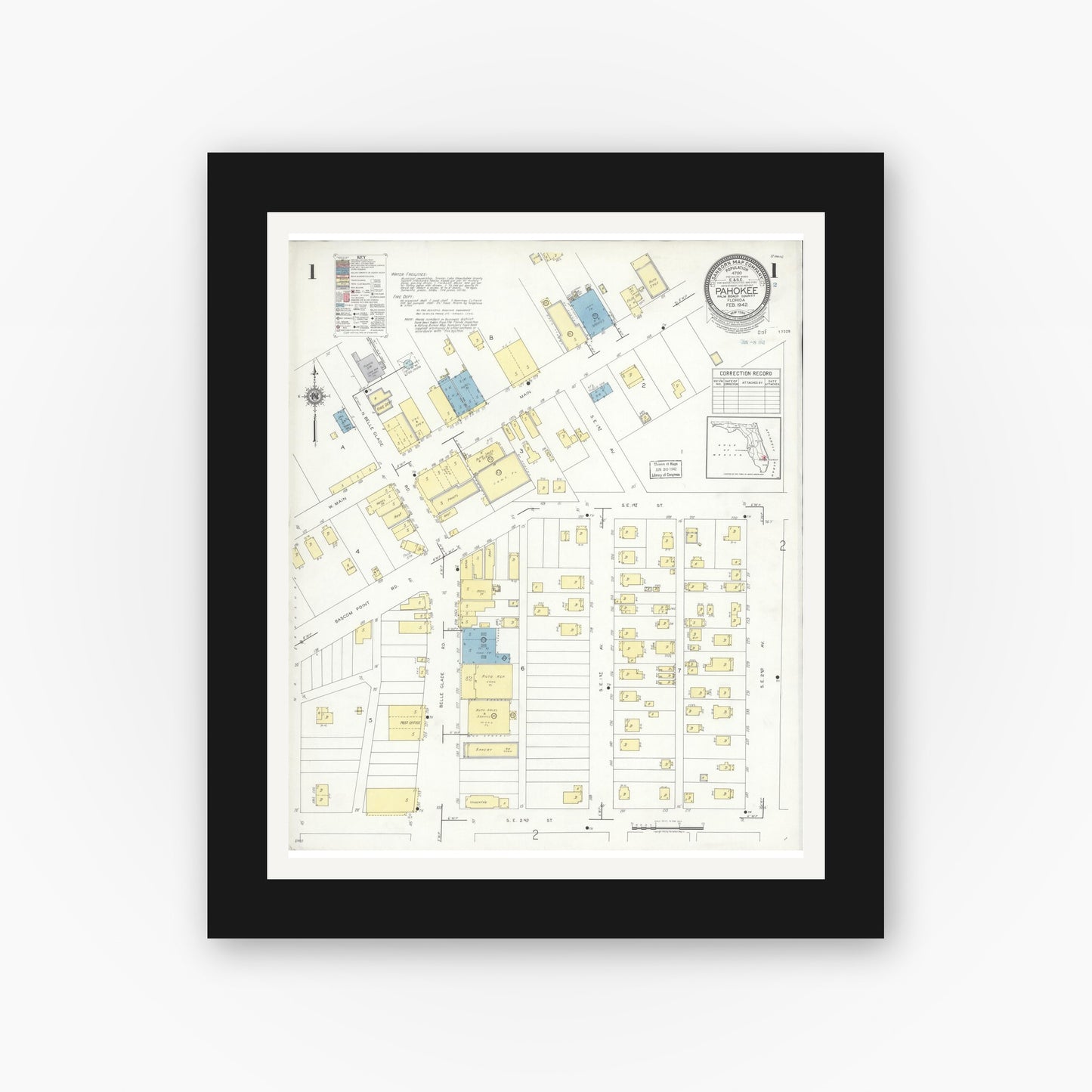 Old map wall art mockup — black gallery frame with white mat — Sanborn Fire Insurance Map from Pahokee, Palm Beach County, Florida (1942), Sheet #0001