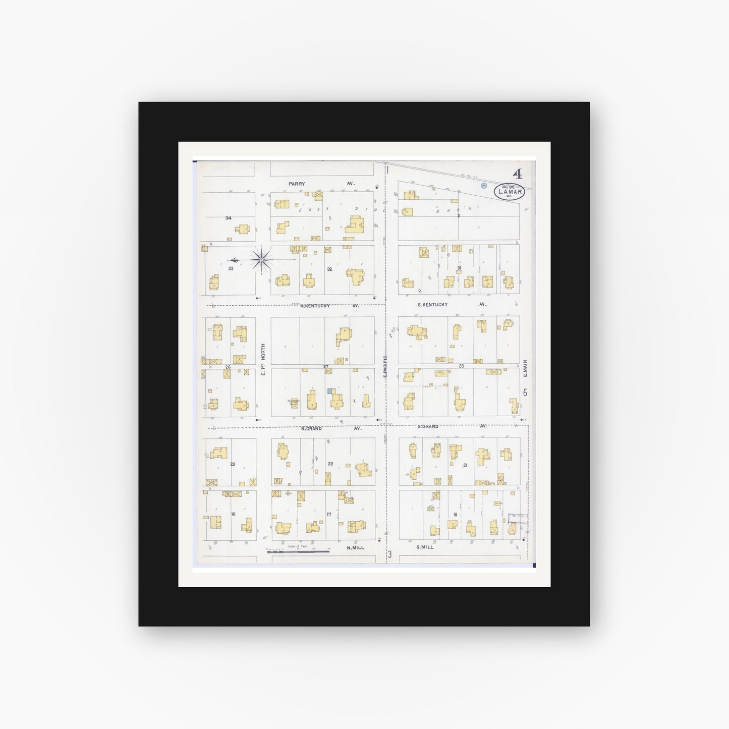 Old map wall art mockup — black gallery frame with white mat — Sanborn Fire Insurance Map from Lamar, Barton County, Missouri (1902), Sheet #0004
