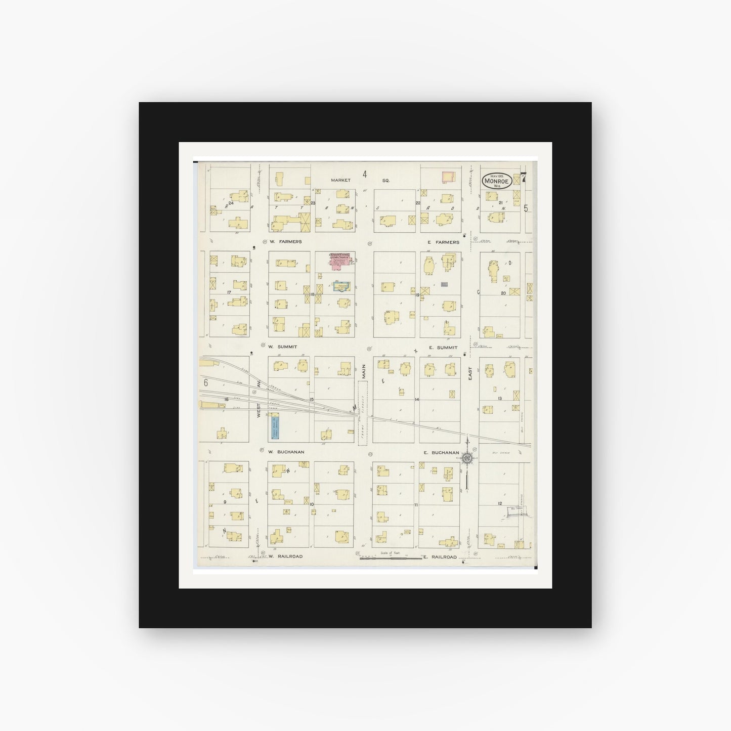 Old map wall art mockup — black gallery frame with white mat — Sanborn Fire Insurance Map from Monroe, Green County, Wisconsin (1915), Sheet #0007