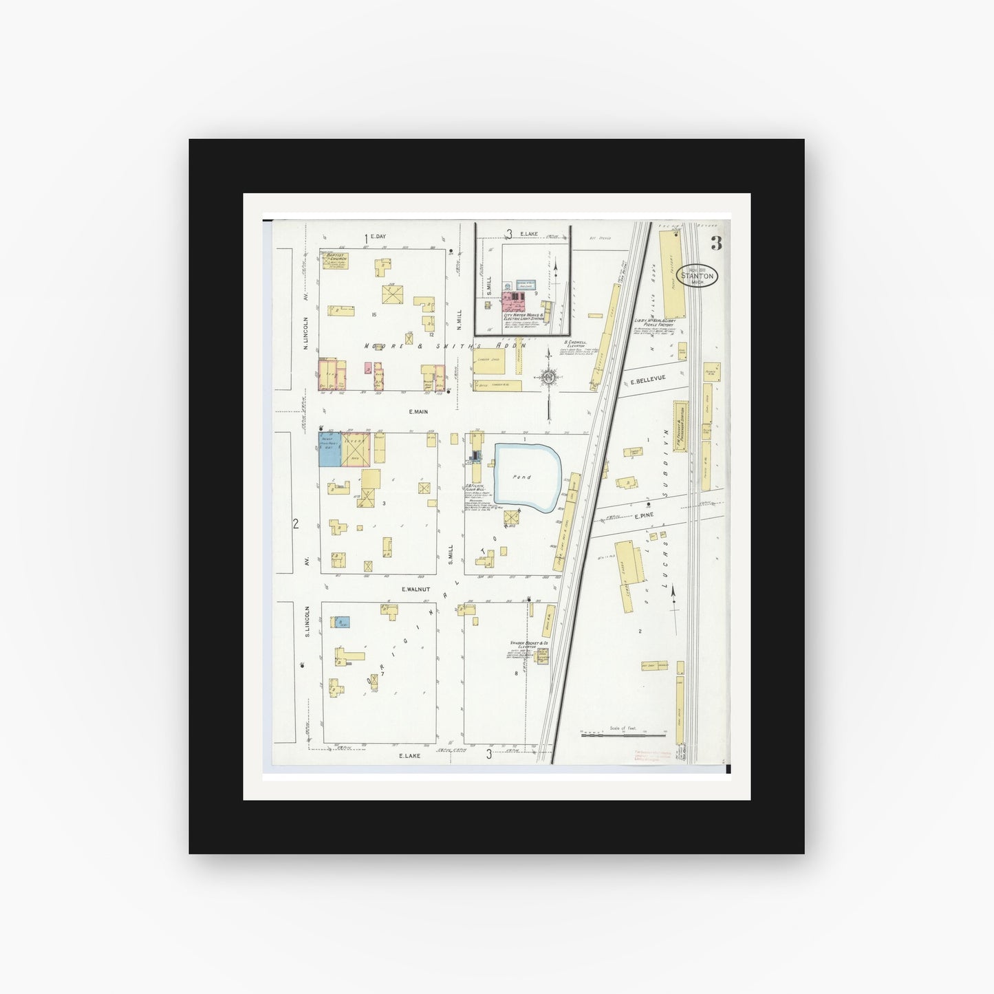 Old map wall art mockup — black gallery frame with white mat — Sanborn Fire Insurance Map from Stanton, Montcalm County, Michigan (1911), Sheet #0003