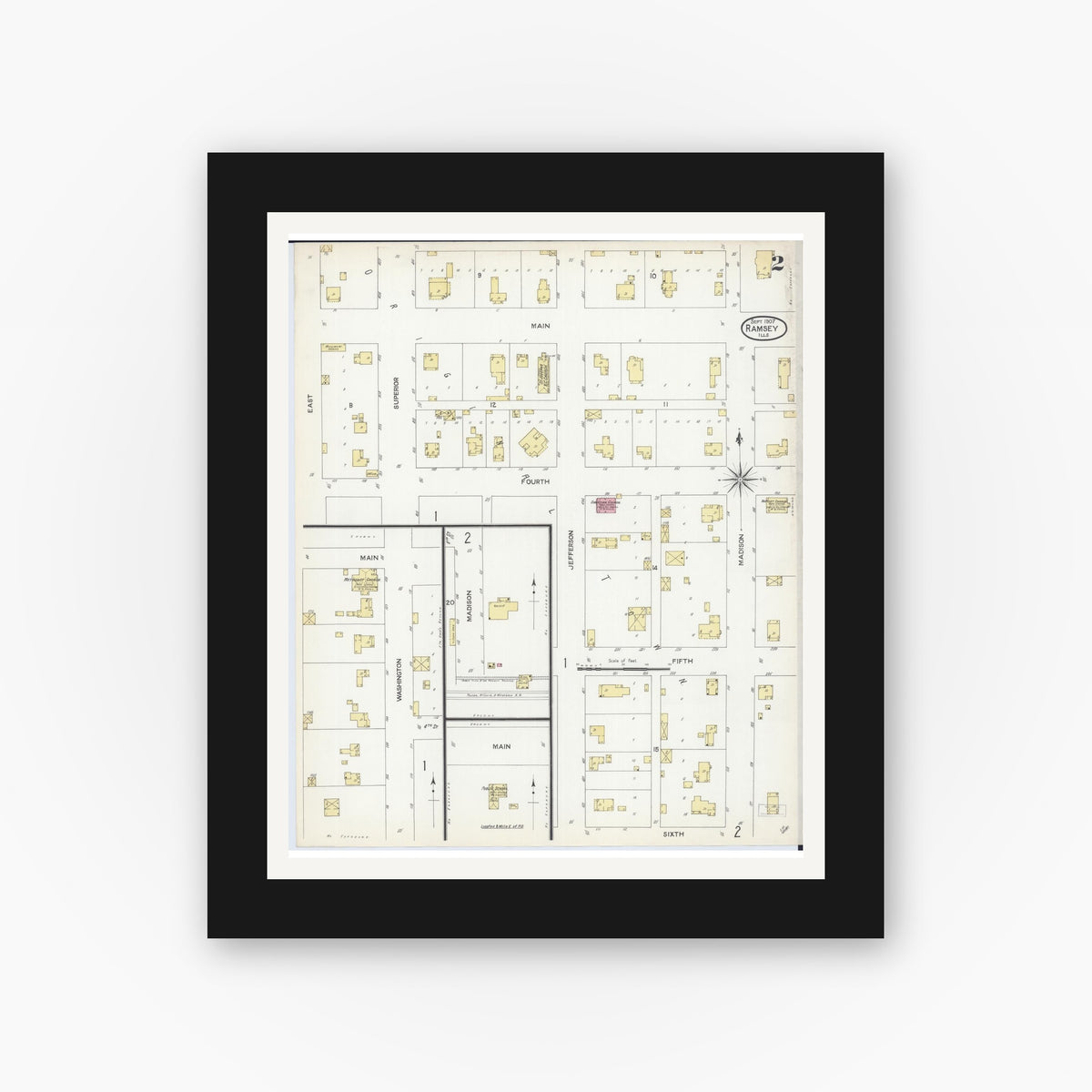 Old map wall art mockup — black gallery frame with white mat — Sanborn Fire Insurance Map from Ramsey, Fayette County, Illinois (1907), Sheet #0002