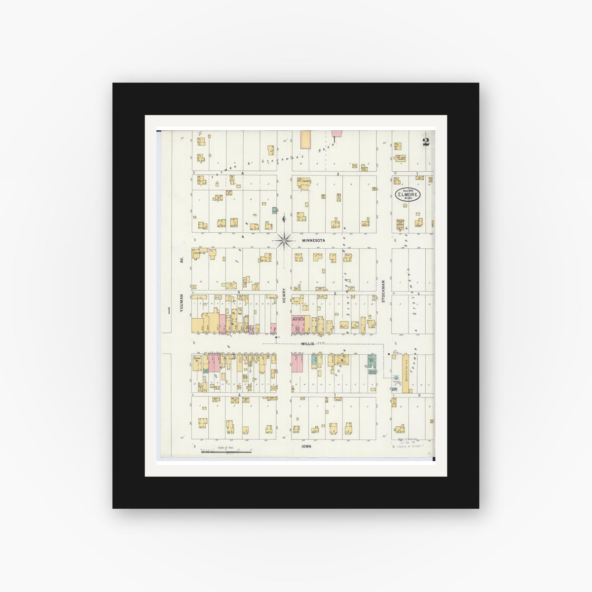 Old map wall art mockup — black gallery frame with white mat — Sanborn Fire Insurance Map from Elmore, Faribault County, Minnesota (1899), Sheet #0002