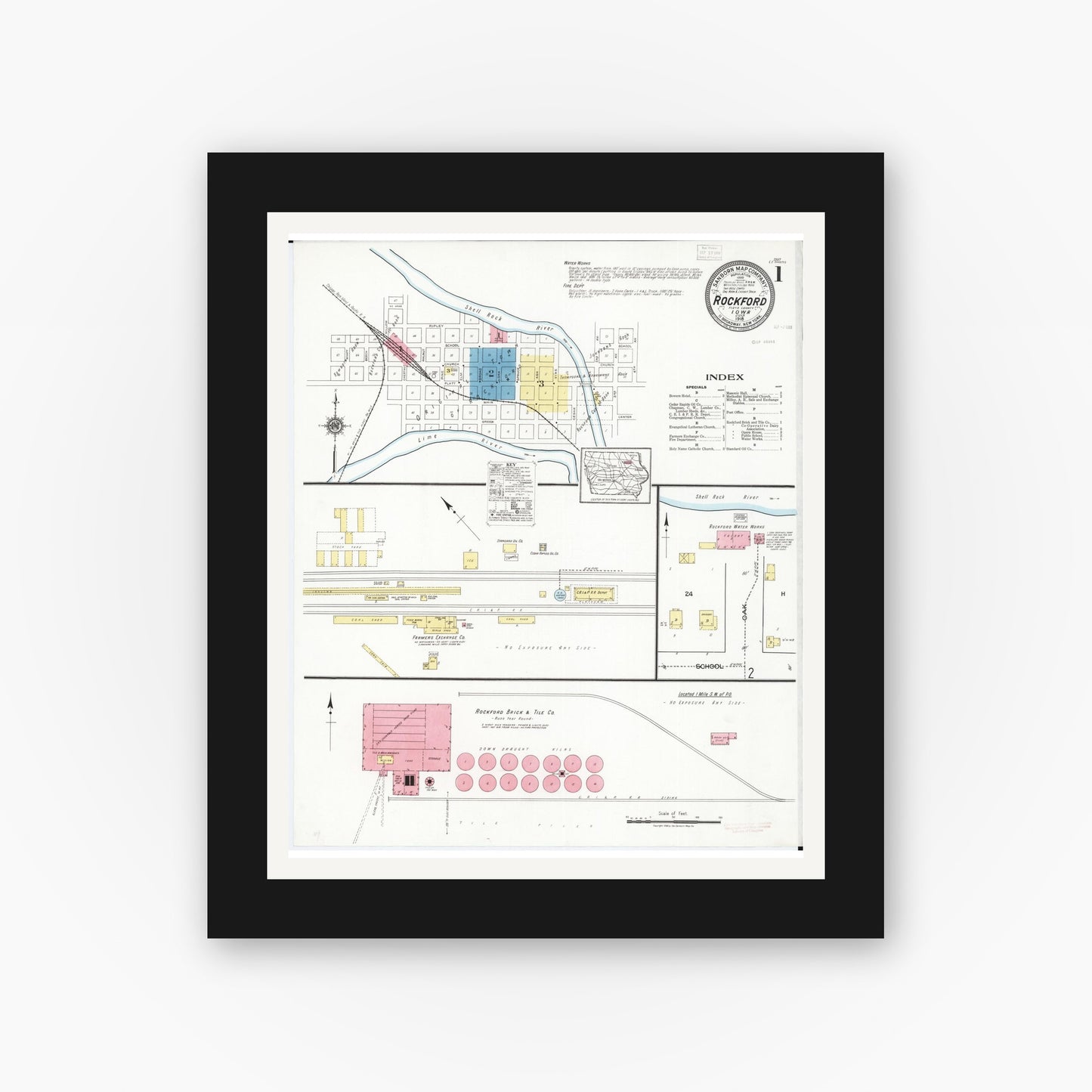 Old map wall art mockup — black gallery frame with white mat — Sanborn Fire Insurance Map from Rockford, Floyd County, Iowa (1918) — Complete Set