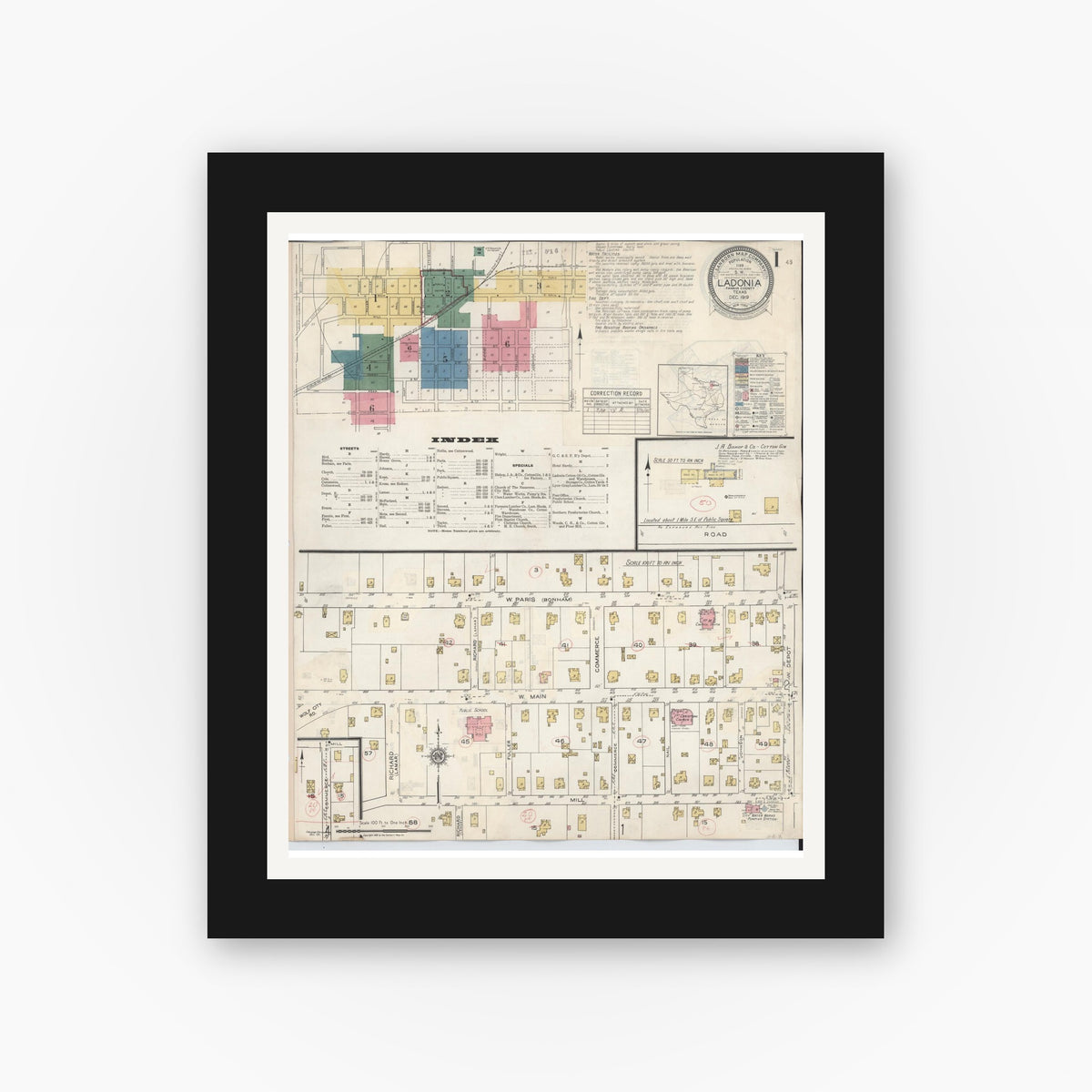 Old map wall art mockup — black gallery frame with white mat — Sanborn Fire Insurance Map from Ladonia, Fannin County, Texas (1934), Sheet #0001