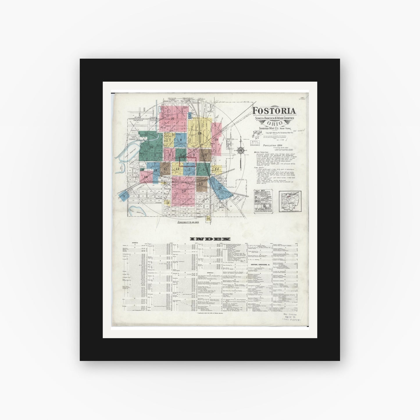 Old map wall art mockup — black gallery frame with white mat — Sanborn Fire Insurance Map from Fostoria, Seneca, Hancock, And Wood Counties, Ohio (1924), Sheet #0001