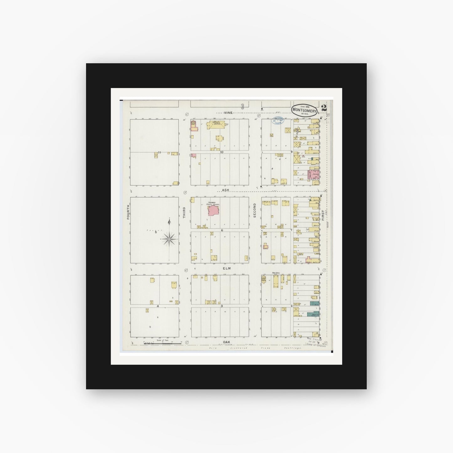 Old map wall art mockup — black gallery frame with white mat — Sanborn Fire Insurance Map from Montgomery, Le Sueur County, Minnesota (1894), Sheet #0002