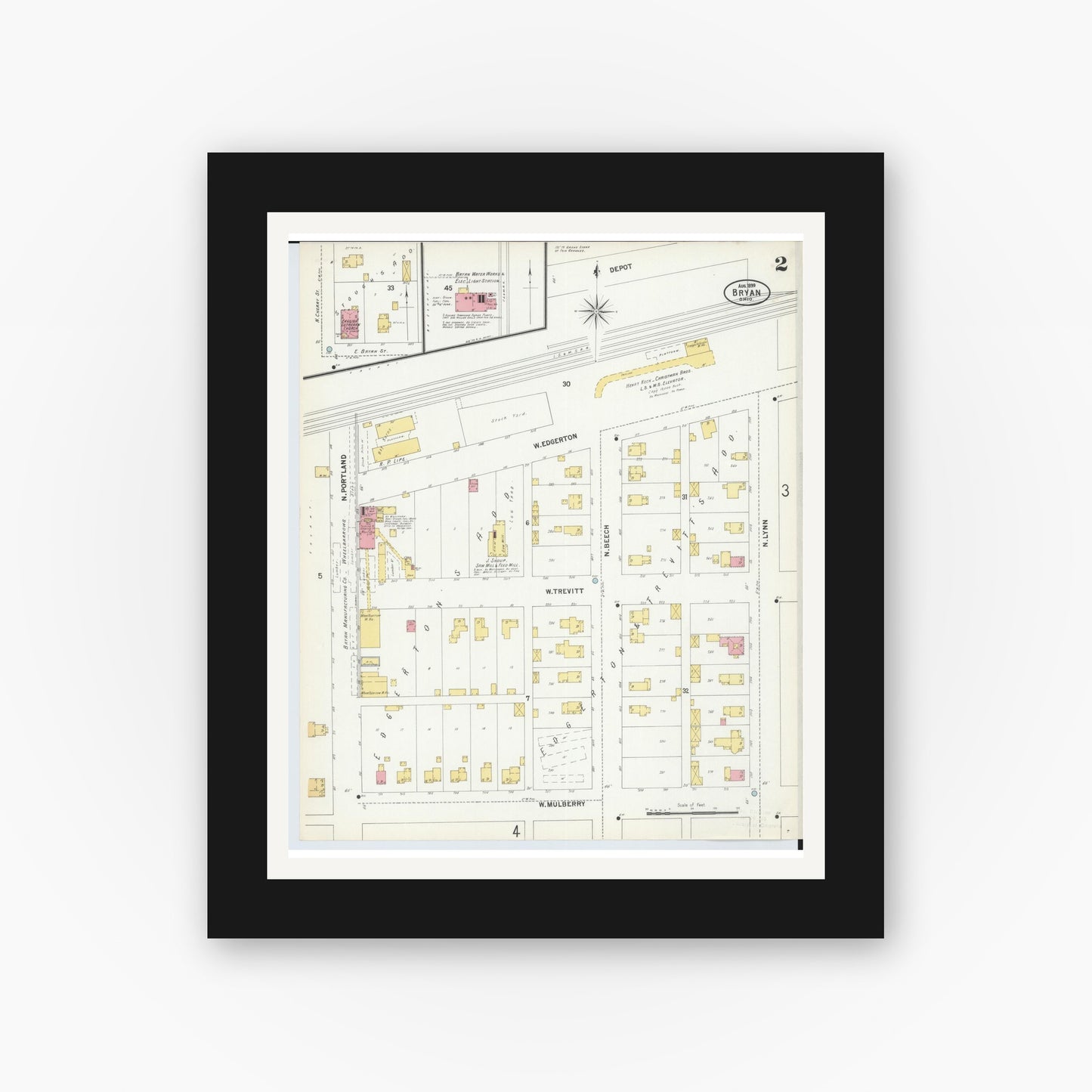 Old map wall art mockup — black gallery frame with white mat — Sanborn Fire Insurance Map from Bryan, Williams County, Ohio (1899), Sheet #0002