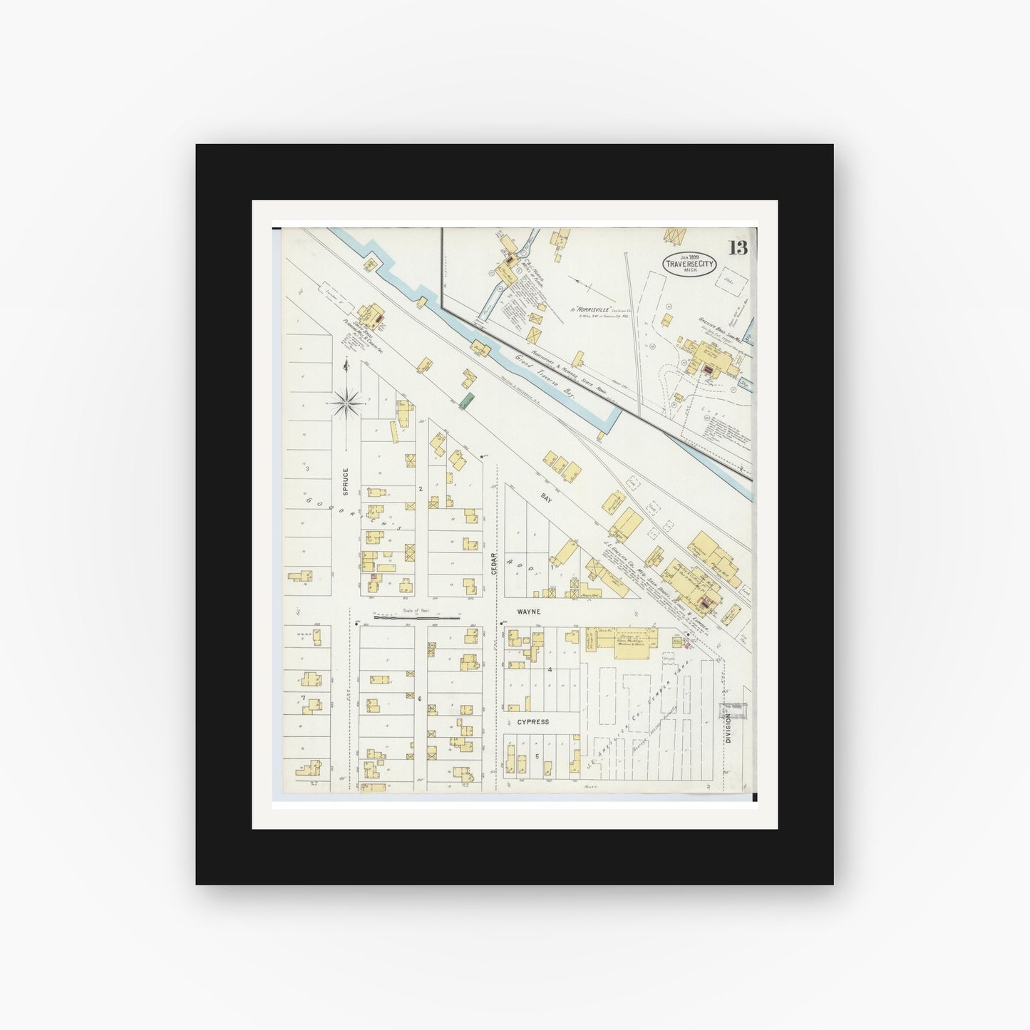 Old map wall art mockup — black gallery frame with white mat — Sanborn Fire Insurance Map from Traverse City, Grand Traverse County, Michigan (1899), Sheet #0013