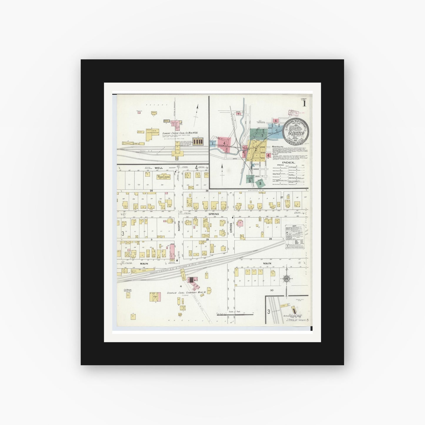 Old map wall art mockup — black gallery frame with white mat — Sanborn Fire Insurance Map from Glouster, Athens County, Ohio (1910), Sheet #0001
