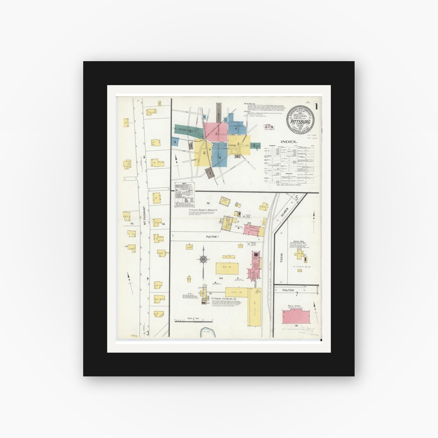 Old map wall art mockup — black gallery frame with white mat — Sanborn Fire Insurance Map from Pittsburg, Camp County, Texas (1911), Sheet #0001