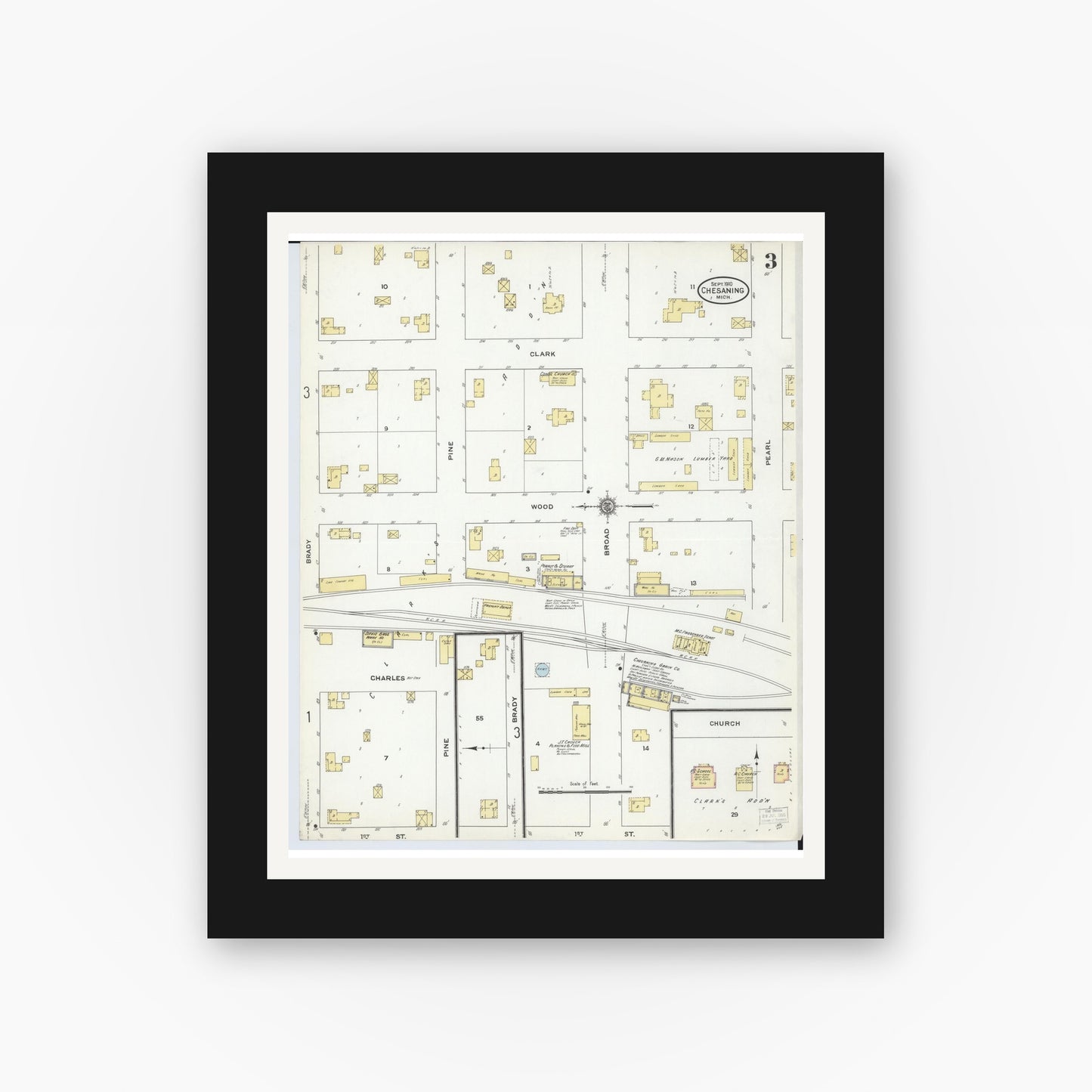 Old map wall art mockup — black gallery frame with white mat — Sanborn Fire Insurance Map from Chesaning, Saginaw County, Michigan (1910), Sheet #0003