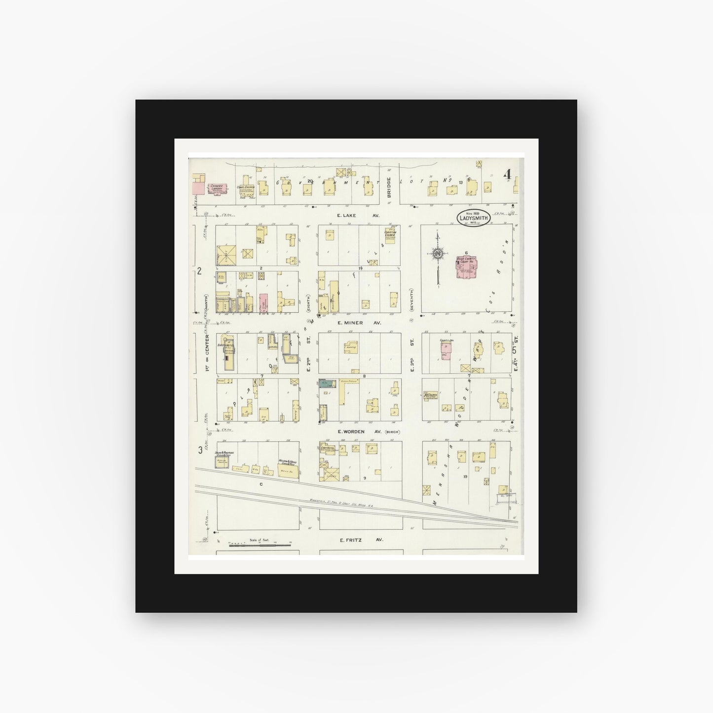 Old map wall art mockup — black gallery frame with white mat — Sanborn Fire Insurance Map from Ladysmith, Rusk County, Wisconsin (1909), Sheet #0004