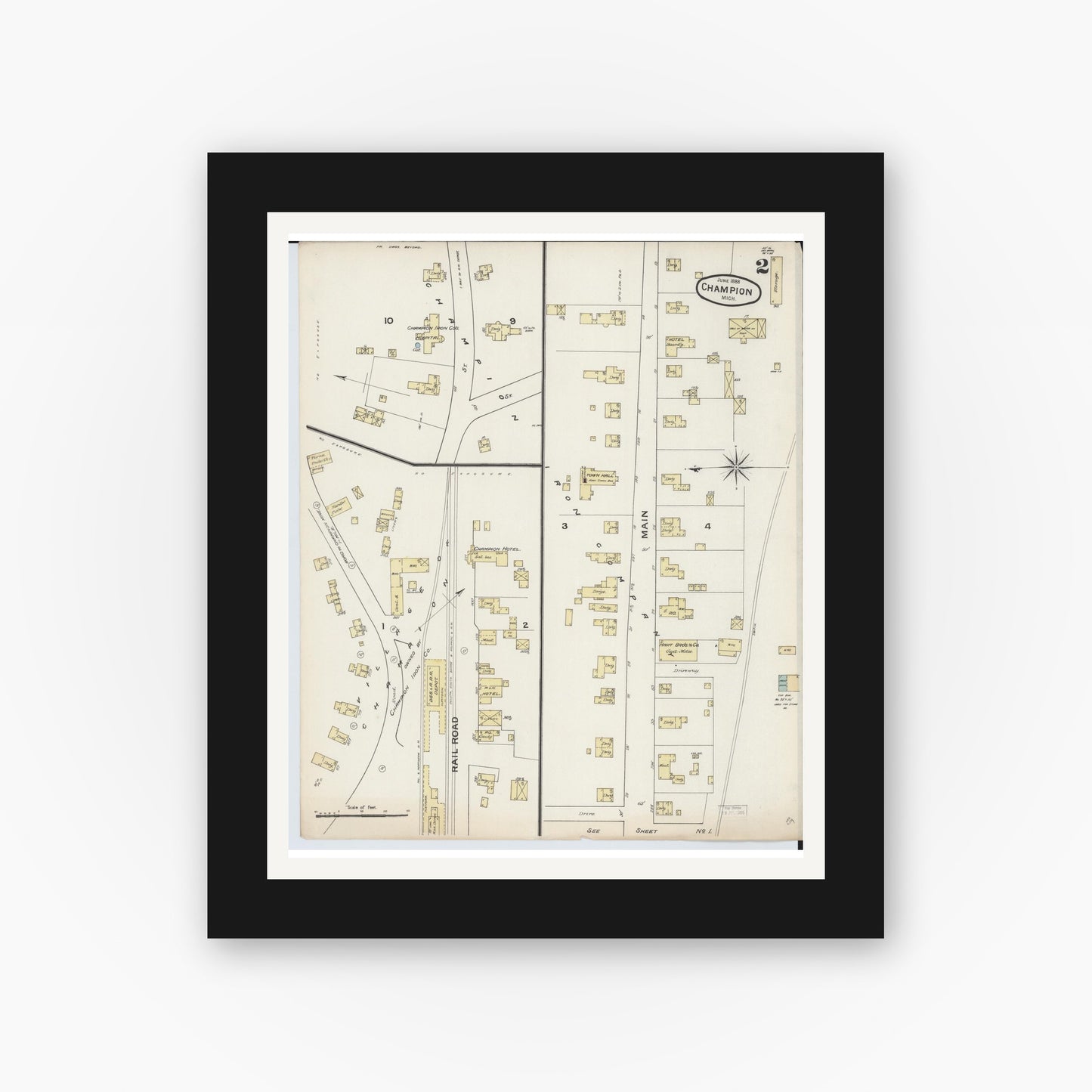 Old map wall art mockup — black gallery frame with white mat — Sanborn Fire Insurance Map from Champion, Marquette County, Michigan (1888), Sheet #0002
