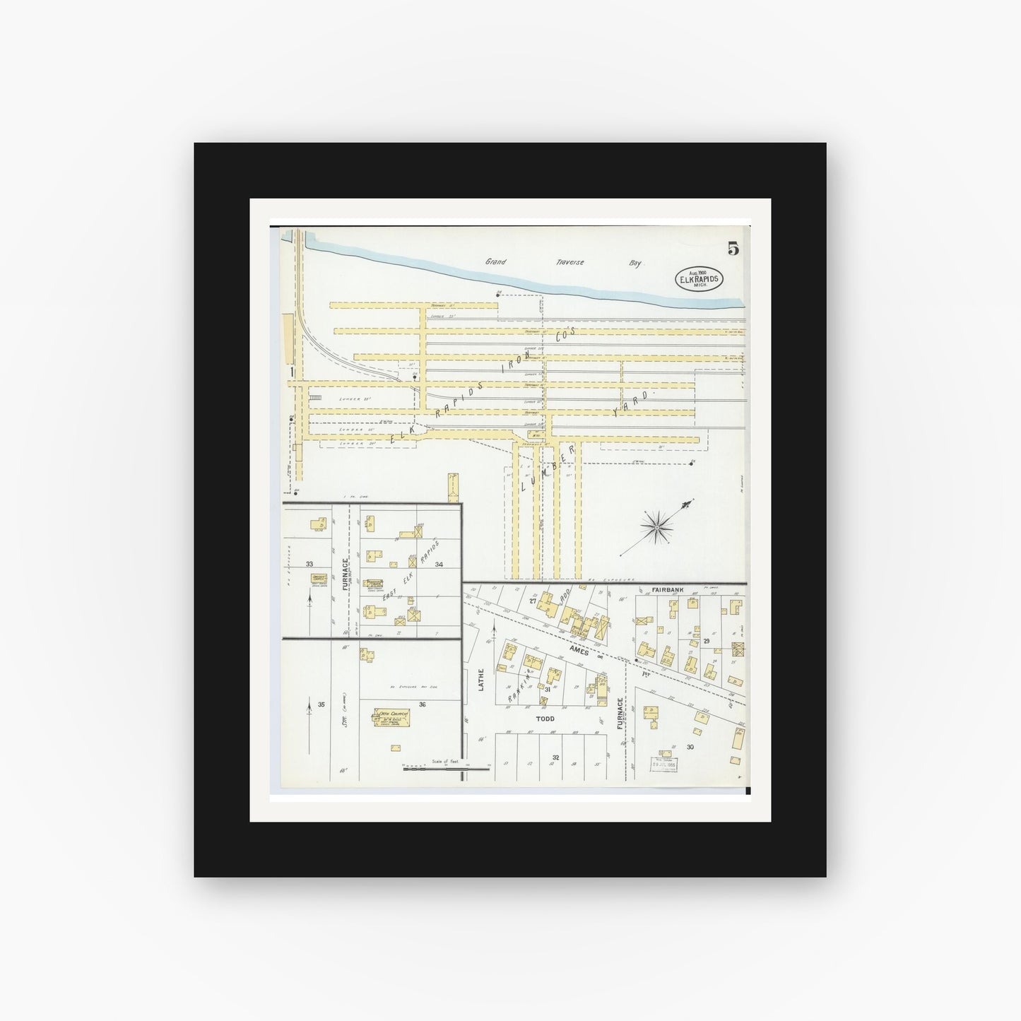 Old map wall art mockup — black gallery frame with white mat — Sanborn Fire Insurance Map from Elk Rapids, Antrim County, Michigan (1900), Sheet #0005
