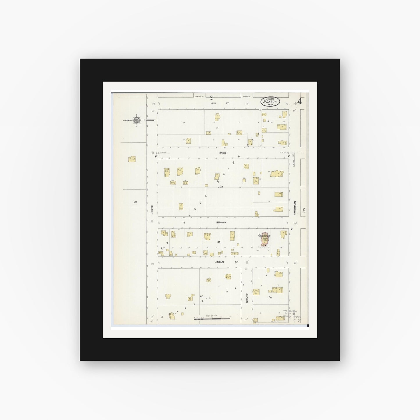 Old map wall art mockup — black gallery frame with white mat — Sanborn Fire Insurance Map from Jackson, Jackson County, Minnesota (1913), Sheet #0004