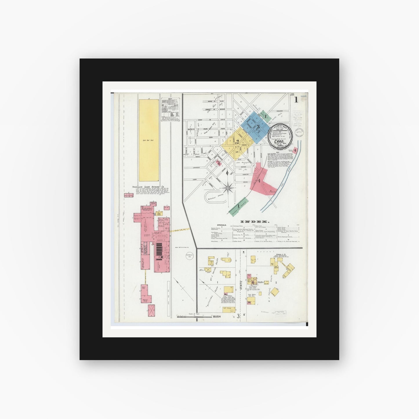 Old map wall art mockup — black gallery frame with white mat — Sanborn Fire Insurance Map from Caro, Tuscola County, Michigan (1900), Sheet #0001