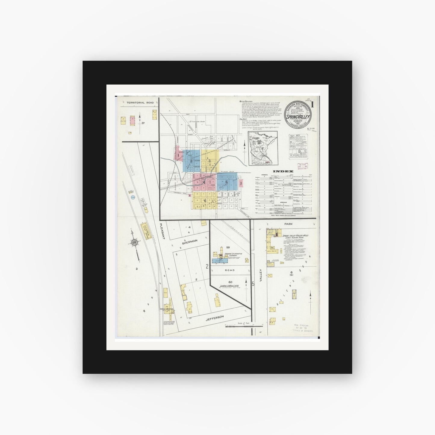 Old map wall art mockup — black gallery frame with white mat — Sanborn Fire Insurance Map from Spring Valley, Fillmore County, Minnesota (1915) - Complete Map Set