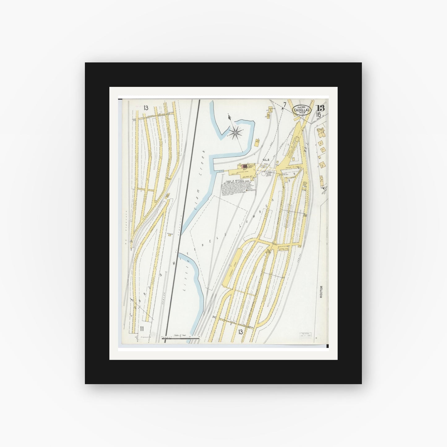 Old map wall art mockup — black gallery frame with white mat — Sanborn Fire Insurance Map from Cadillac, Wexford County, Michigan (1900), Sheet #0013