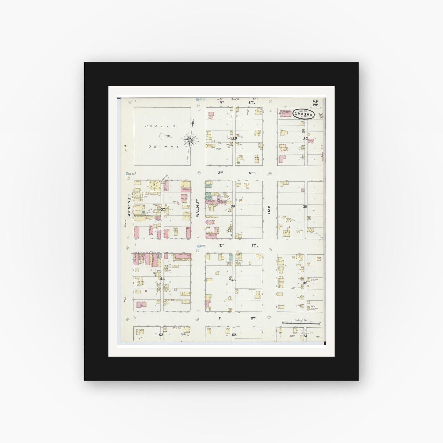 Old map wall art mockup — black gallery frame with white mat — Sanborn Fire Insurance Map from Chaska, Carver County, Minnesota (1891), Sheet #0002