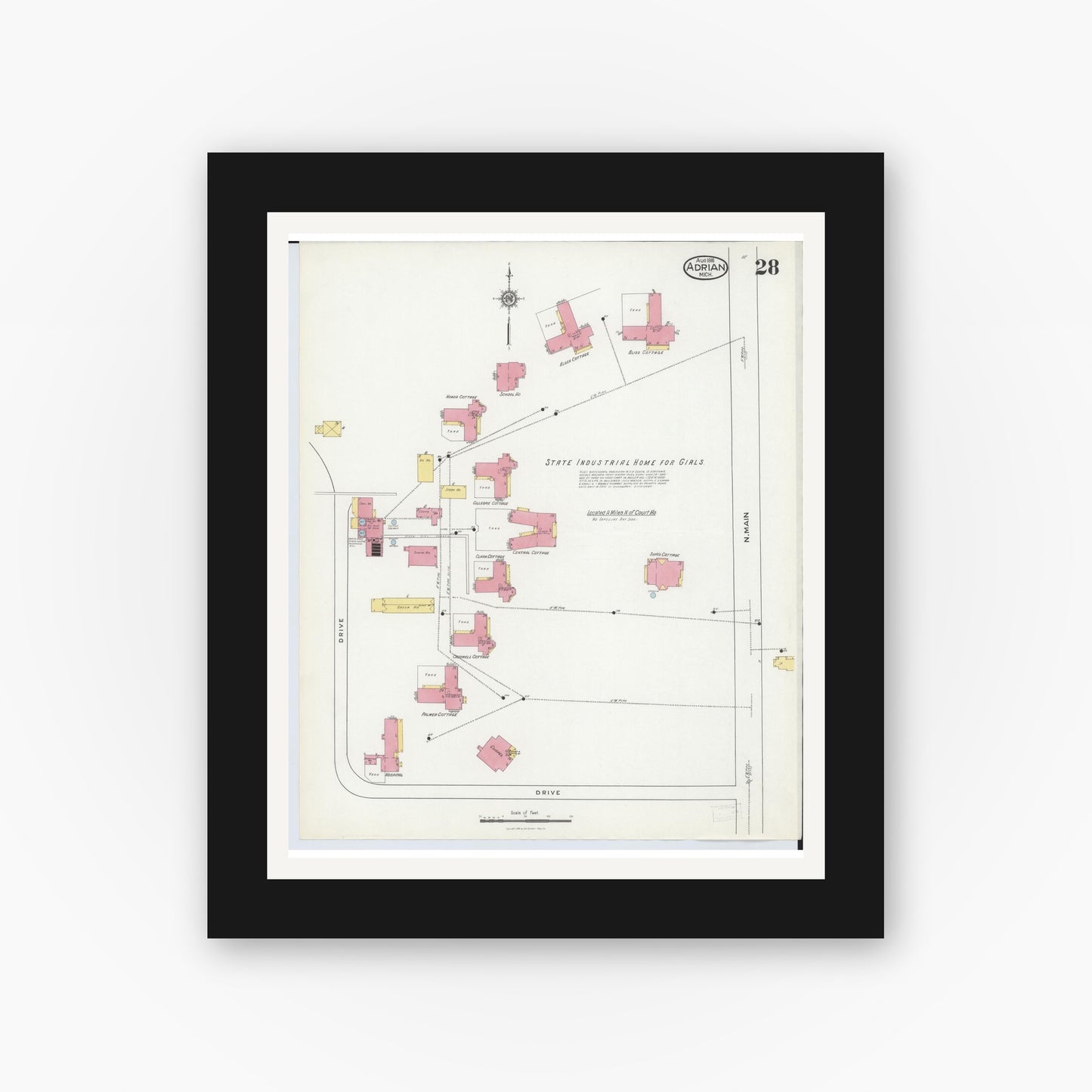 Old map wall art mockup — black gallery frame with white mat — Sanborn Fire Insurance Map from Adrian, Lenawee County, Michigan (1916), Sheet #0028