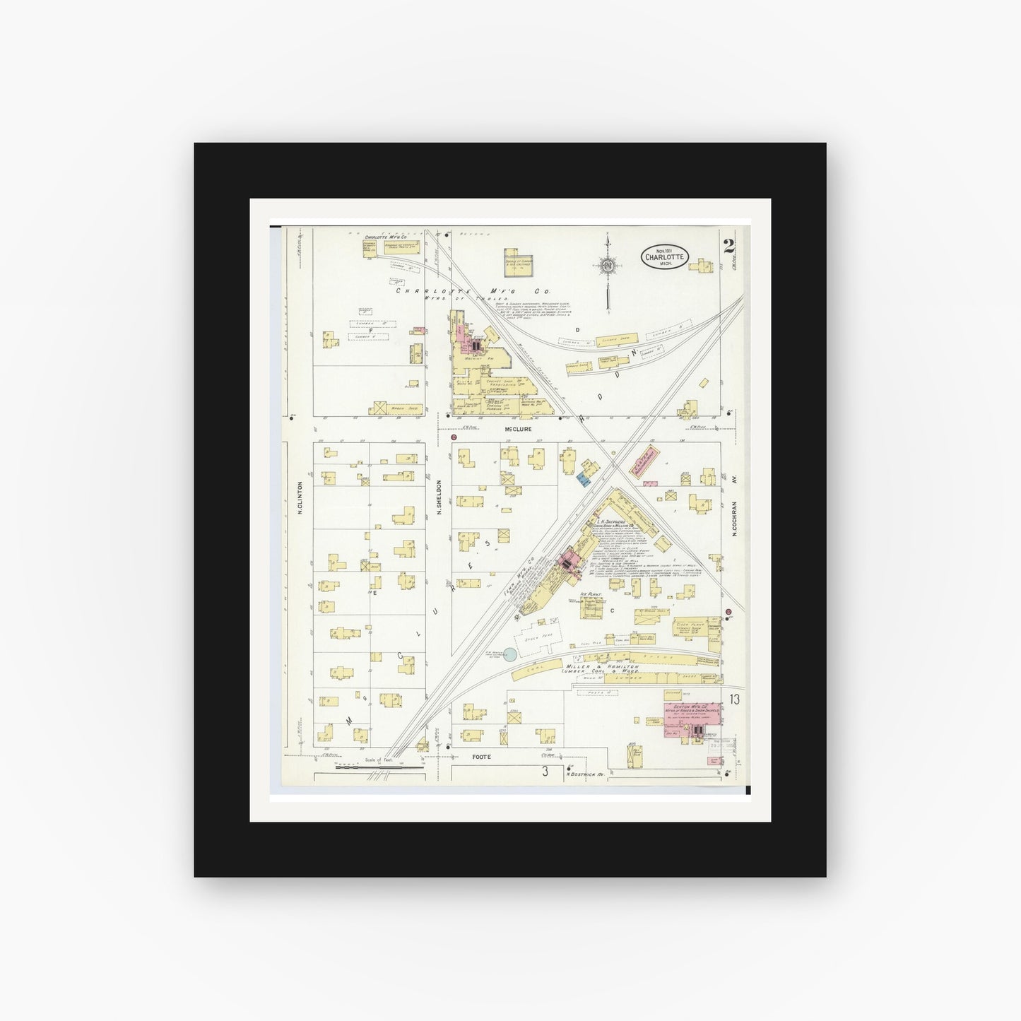 Old map wall art mockup — black gallery frame with white mat — Sanborn Fire Insurance Map from Charlotte, Eaton County, Michigan (1911), Sheet #0002