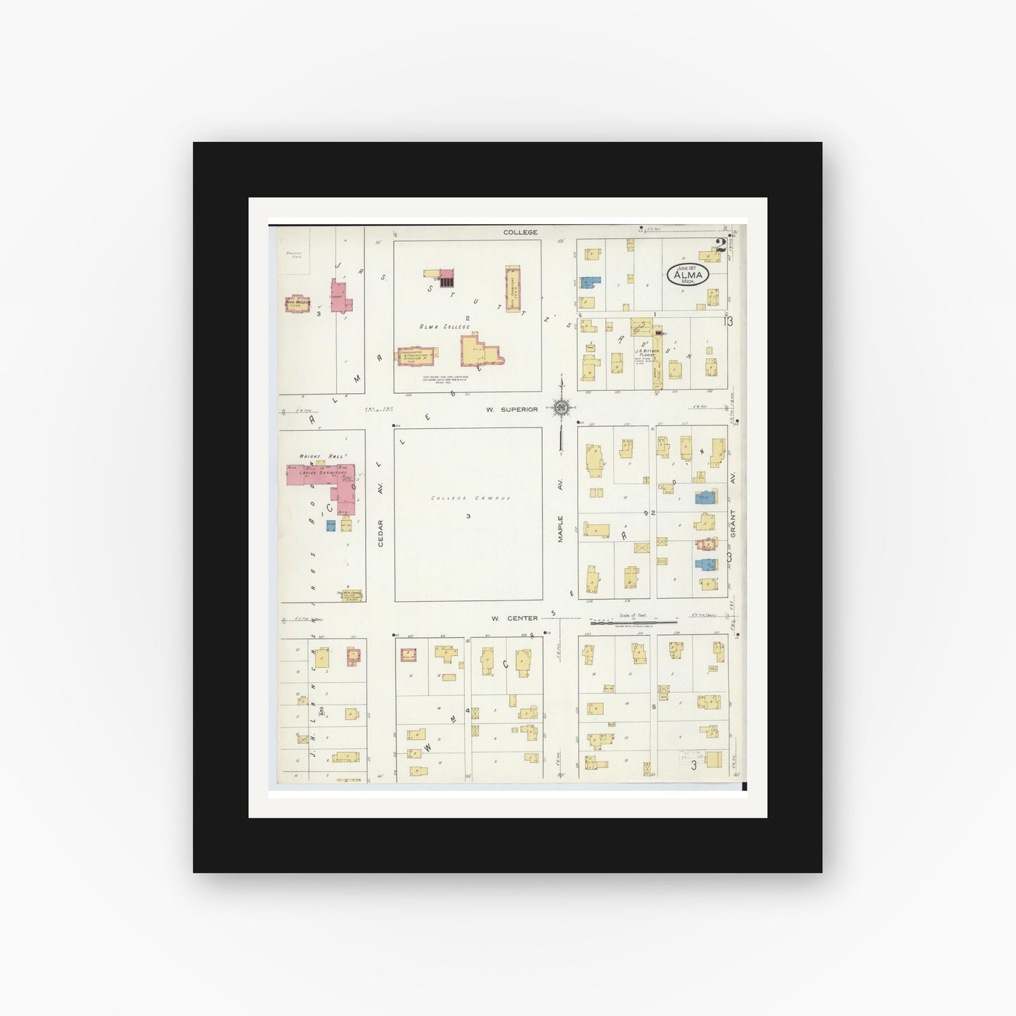 Old map wall art mockup — black gallery frame with white mat — Sanborn Fire Insurance Map from Alma, Gratiot County, Michigan (1917), Sheet #0002