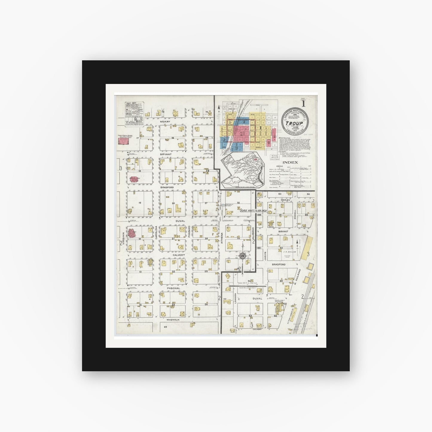 Old map wall art mockup — black gallery frame with white mat — Sanborn Fire Insurance Map from Troup, Smith County, Texas (1919), Sheet #0001
