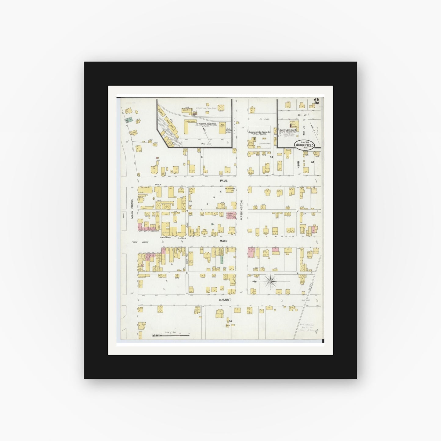Old map wall art mockup — black gallery frame with white mat — Sanborn Fire Insurance Map from Woodsfield, Monroe County, Ohio (1899), Sheet #0002