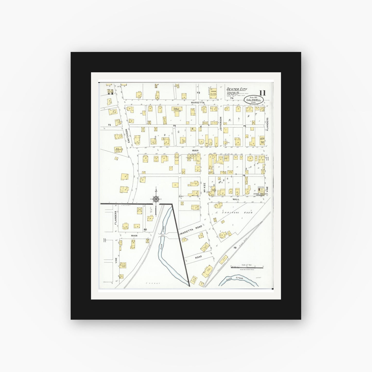 Old map wall art mockup — black gallery frame with white mat — Sanborn Fire Insurance Map from Caldwell, Noble County, Ohio (1923), Sheet #0011
