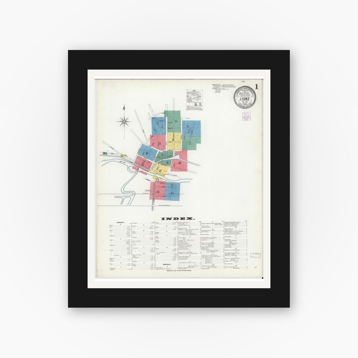 Old map wall art mockup — black gallery frame with white mat — Sanborn Fire Insurance Map from Lyons, Wayne County, New York (1904), Sheet #0001