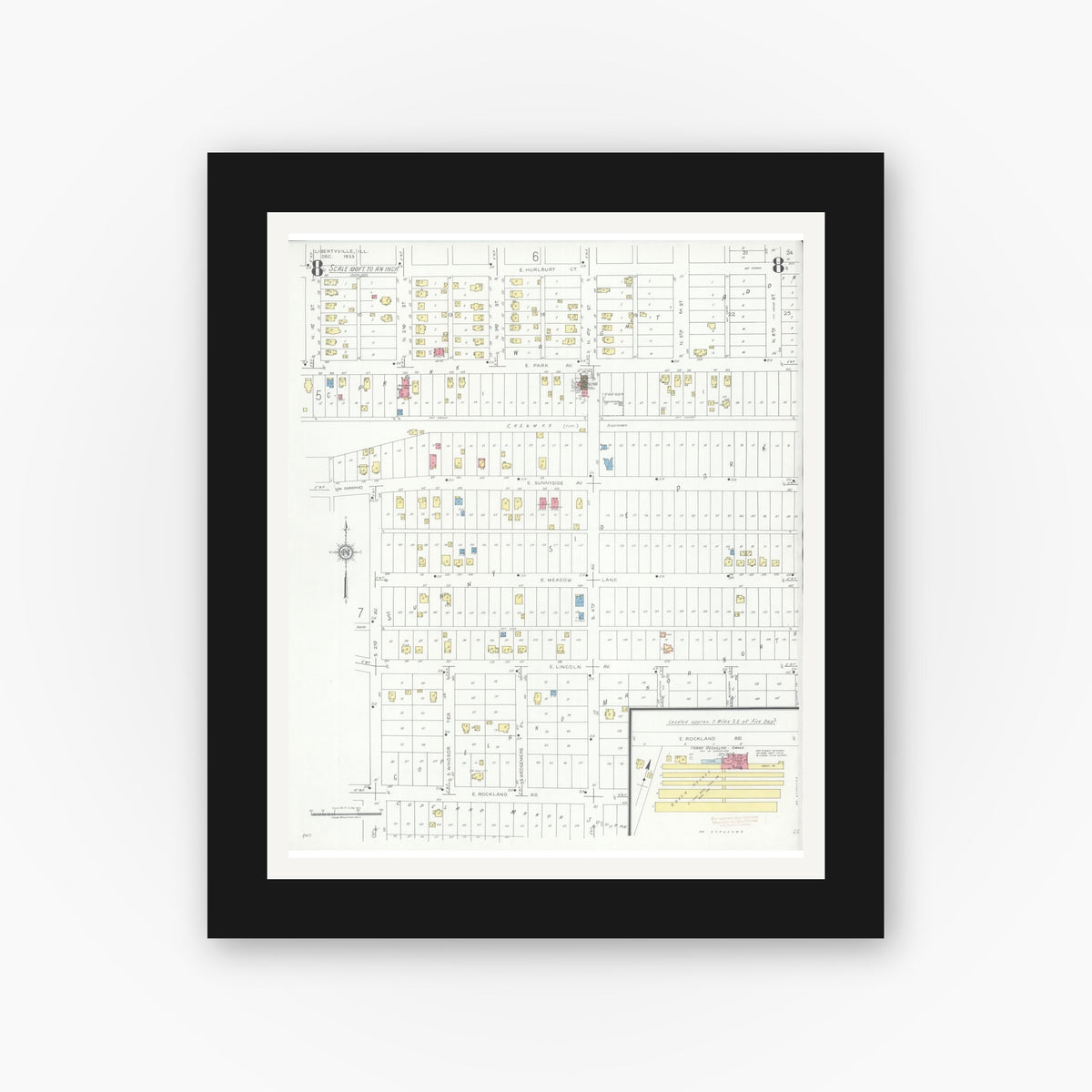 Old map wall art mockup — black gallery frame with white mat — Sanborn Fire Insurance Map from Libertyville, Lake County, Illinois (1933), Sheet #0008