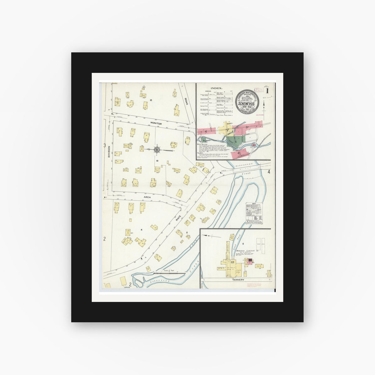 Old map wall art mockup — black gallery frame with white mat — Sanborn Fire Insurance Map from Schenevus, Otsego County, New York (1910), Sheet #0001