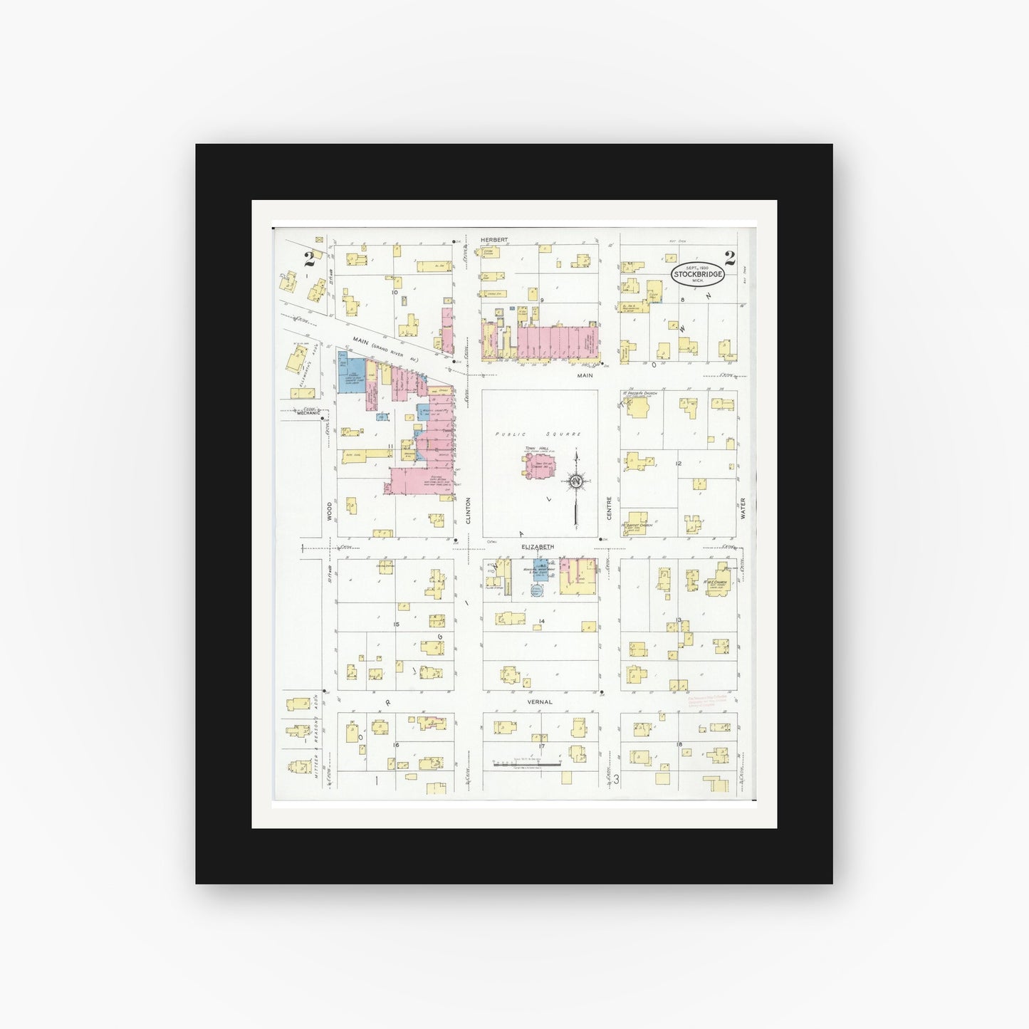 Old map wall art mockup — black gallery frame with white mat — Sanborn Fire Insurance Map from Stockbridge, Ingham County, Michigan (1930), Sheet #0002
